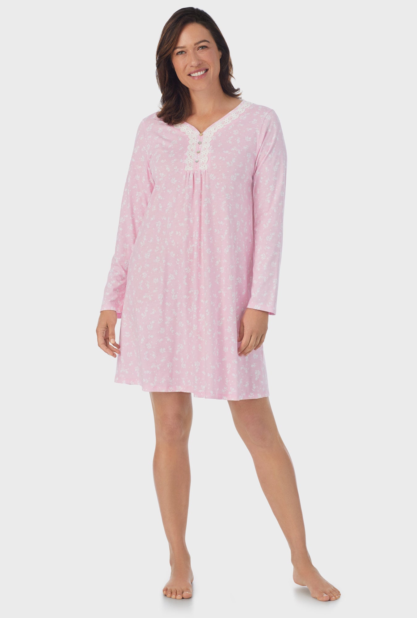 A lady wearing pink Long Sleeve Nightgown with White Rosebuds  print