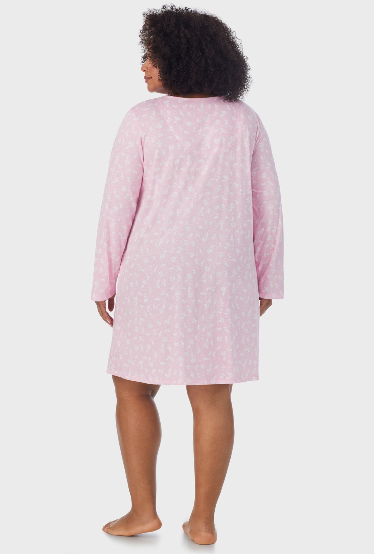 A lady wearing pink Long Sleeve plus size Nightgown with White Rosebuds  print