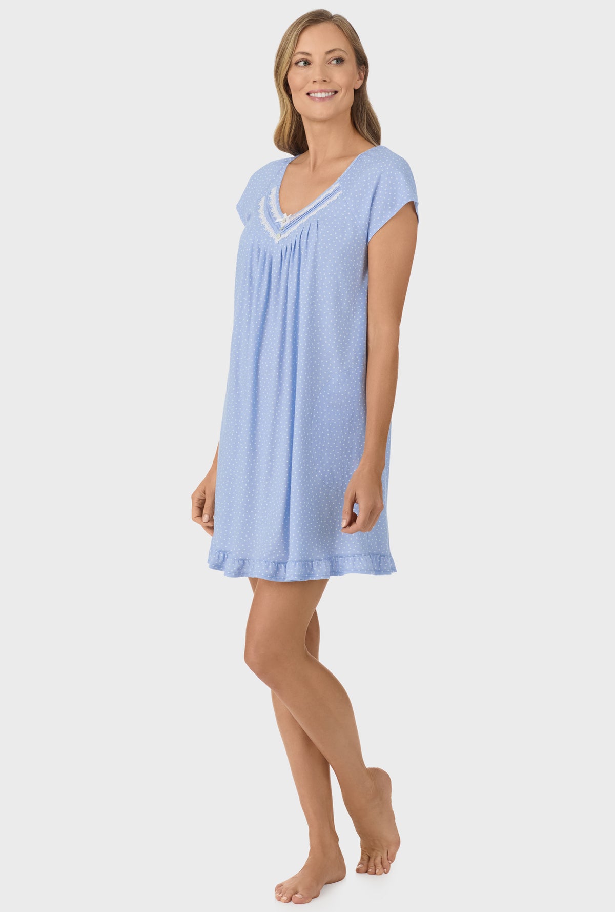 A lady wearing Sky Blue Dot Cap Sleeve Nightgown