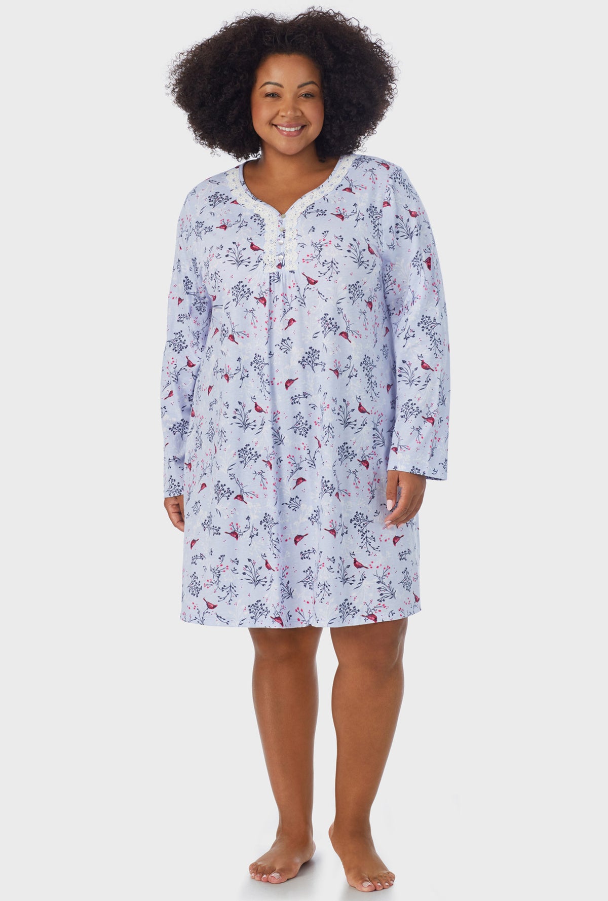 A lady wearing white Long Sleeve plus size Nightgown with Winter Blue print