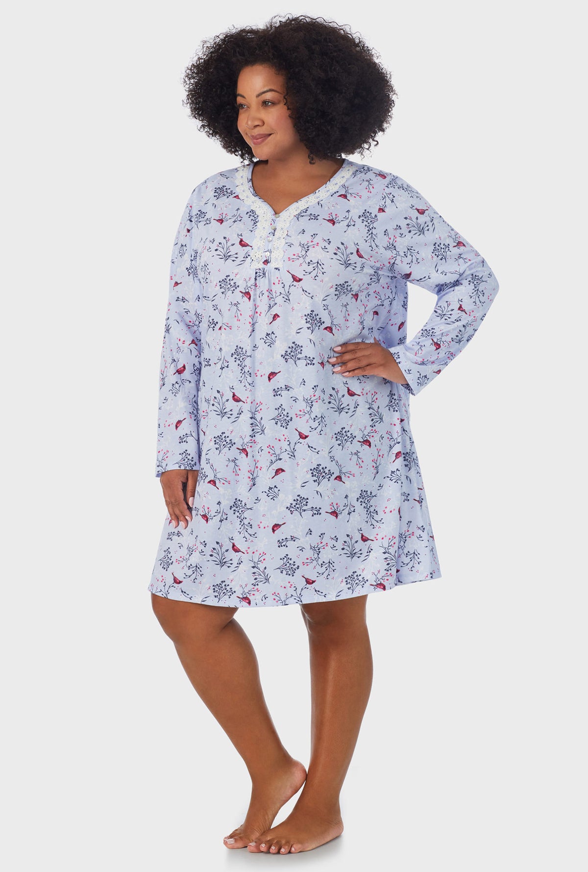 A lady wearing white Long Sleeve plus size Nightgown with Winter Blue print