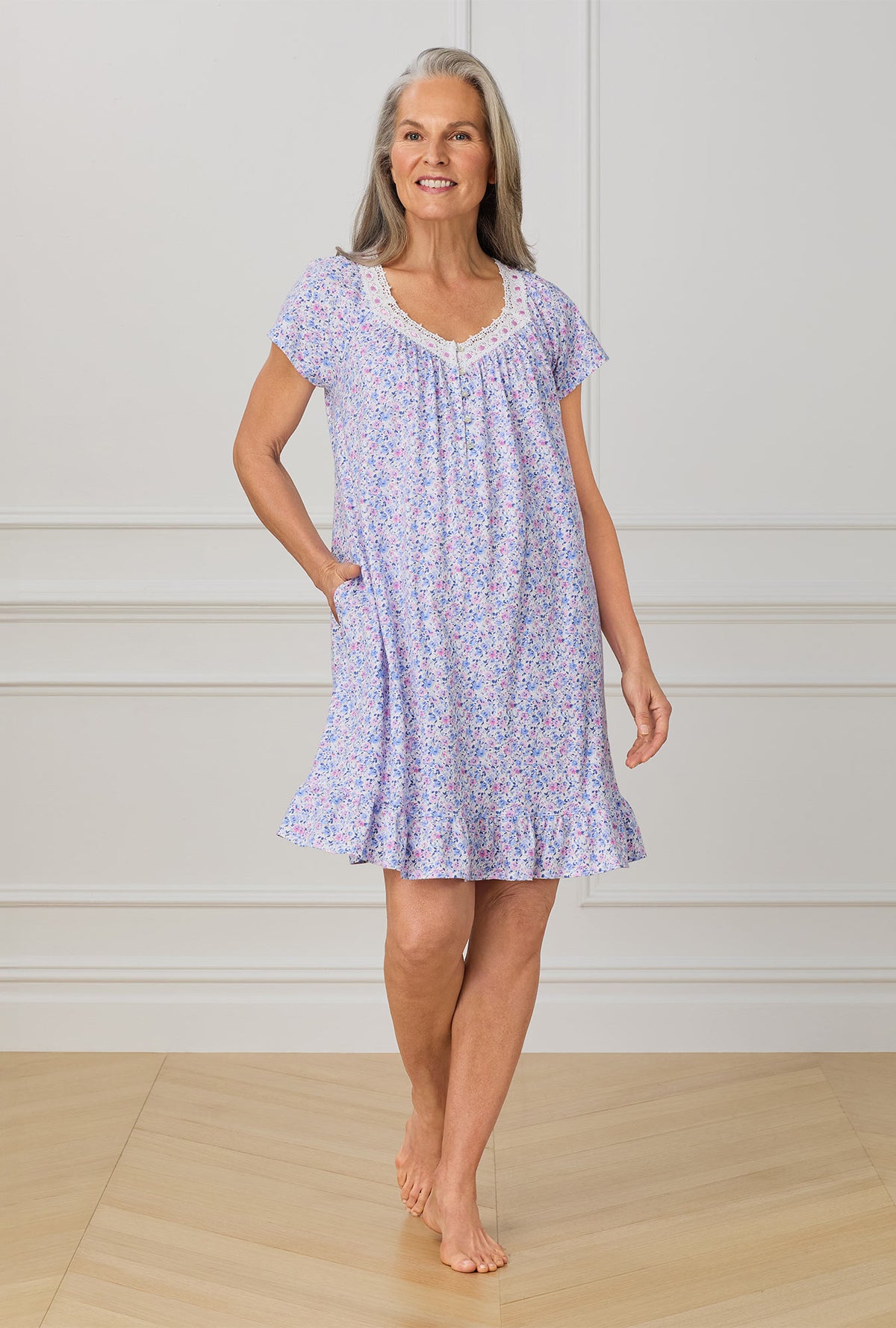 A lady wearing purple short sleeve nightgown with Lavender And Blush Ditsy Floral print.