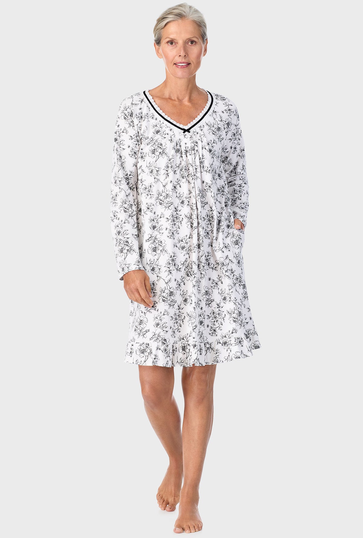 A lady wearing Ivory Floral Long Sleeve Nightshirt