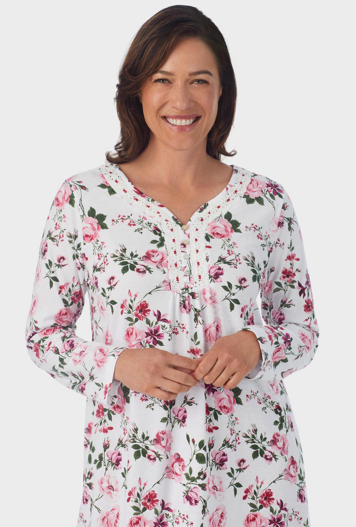 A lady wearing white Long Sleeve Nightgown with Pink and Berry Roses print