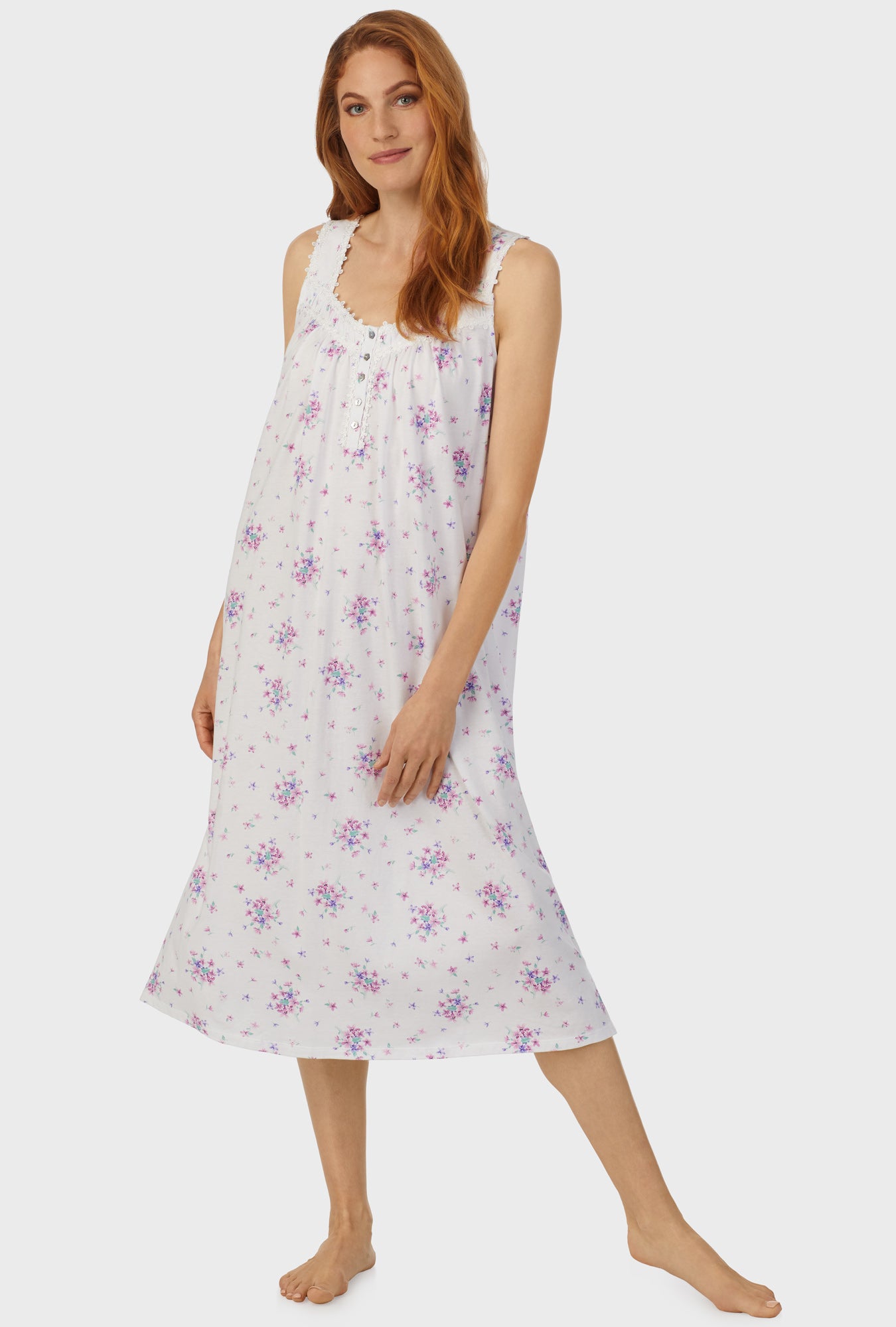 A lady wearing white sleeveless ballet gown with Mulberry Purple Floral Bouquet print.