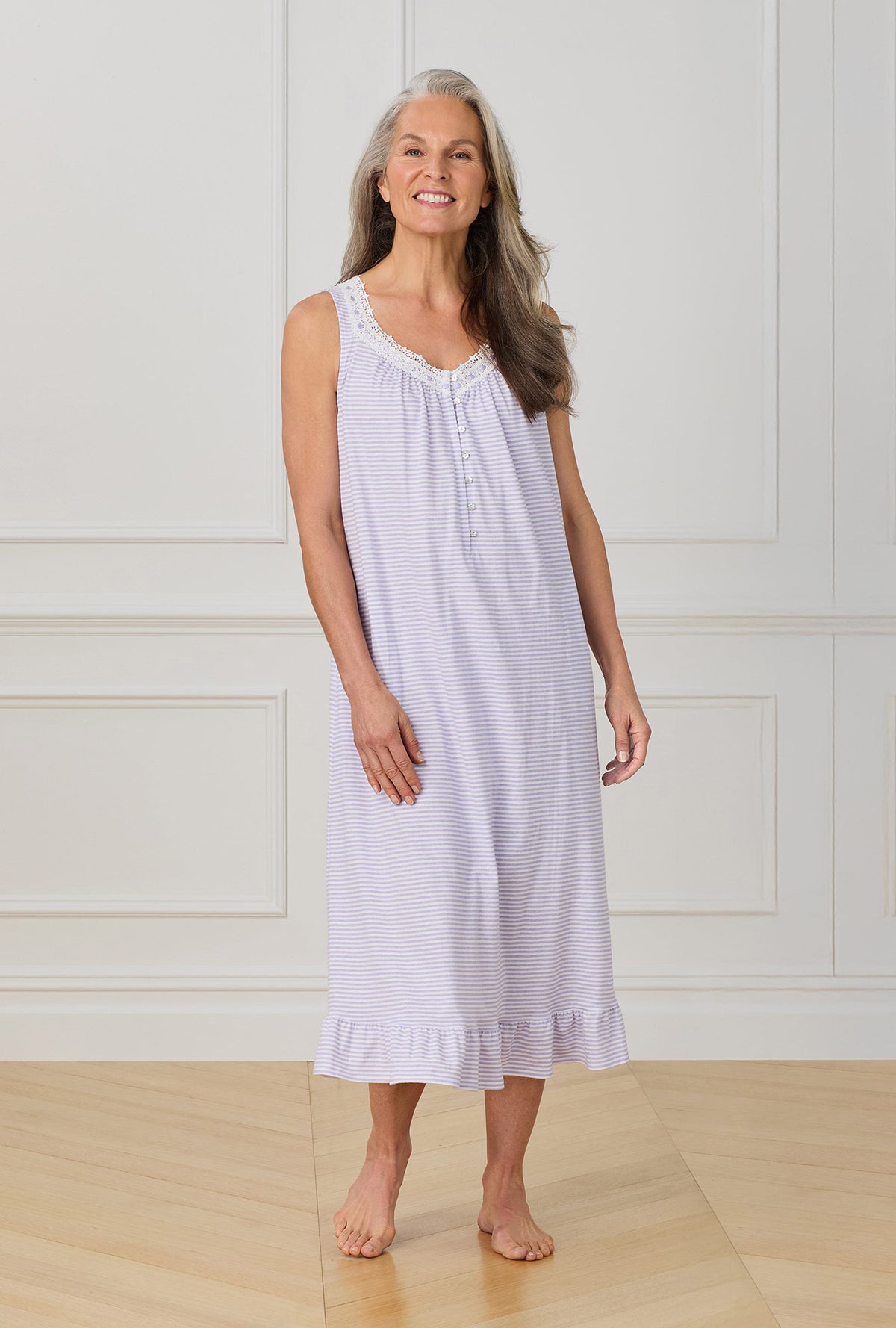 A lady wearing purple sleeveless ballet nightgown with Lilac Stripe print.