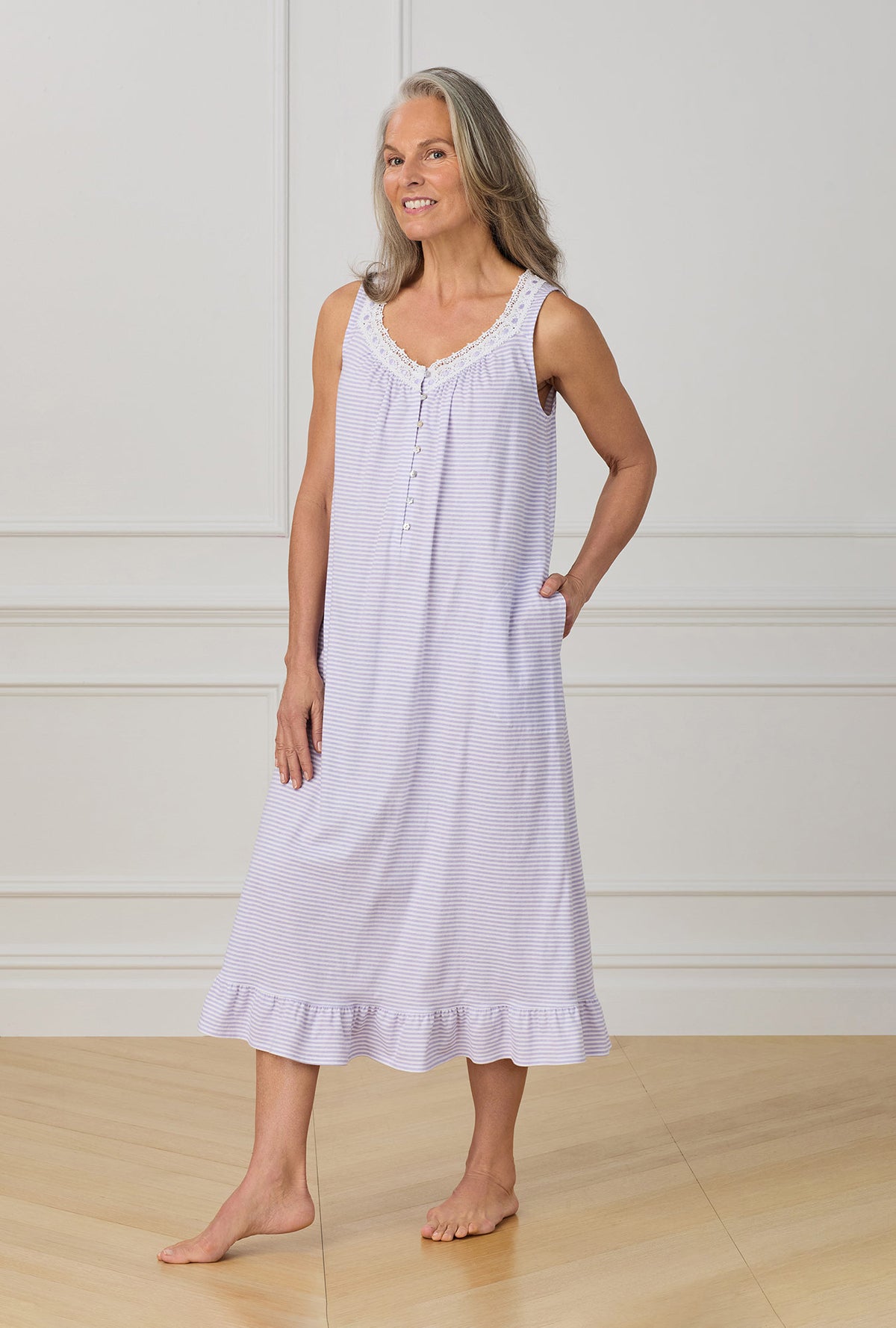 A lady wearing purple sleeveless ballet nightgown with Lilac Stripe print.