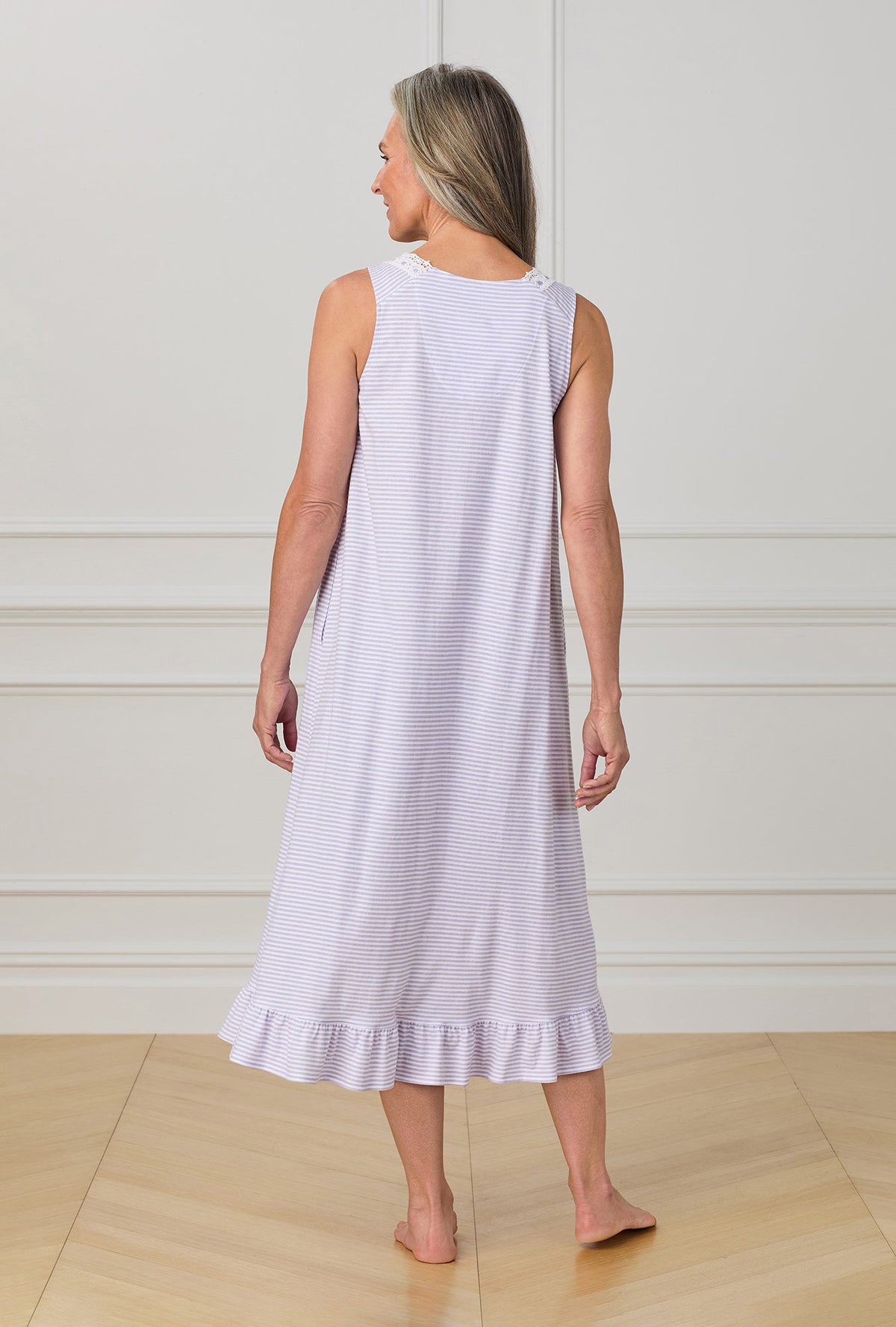 A lady wearing purple sleeveless ballet nightgown with Lilac Stripe print.