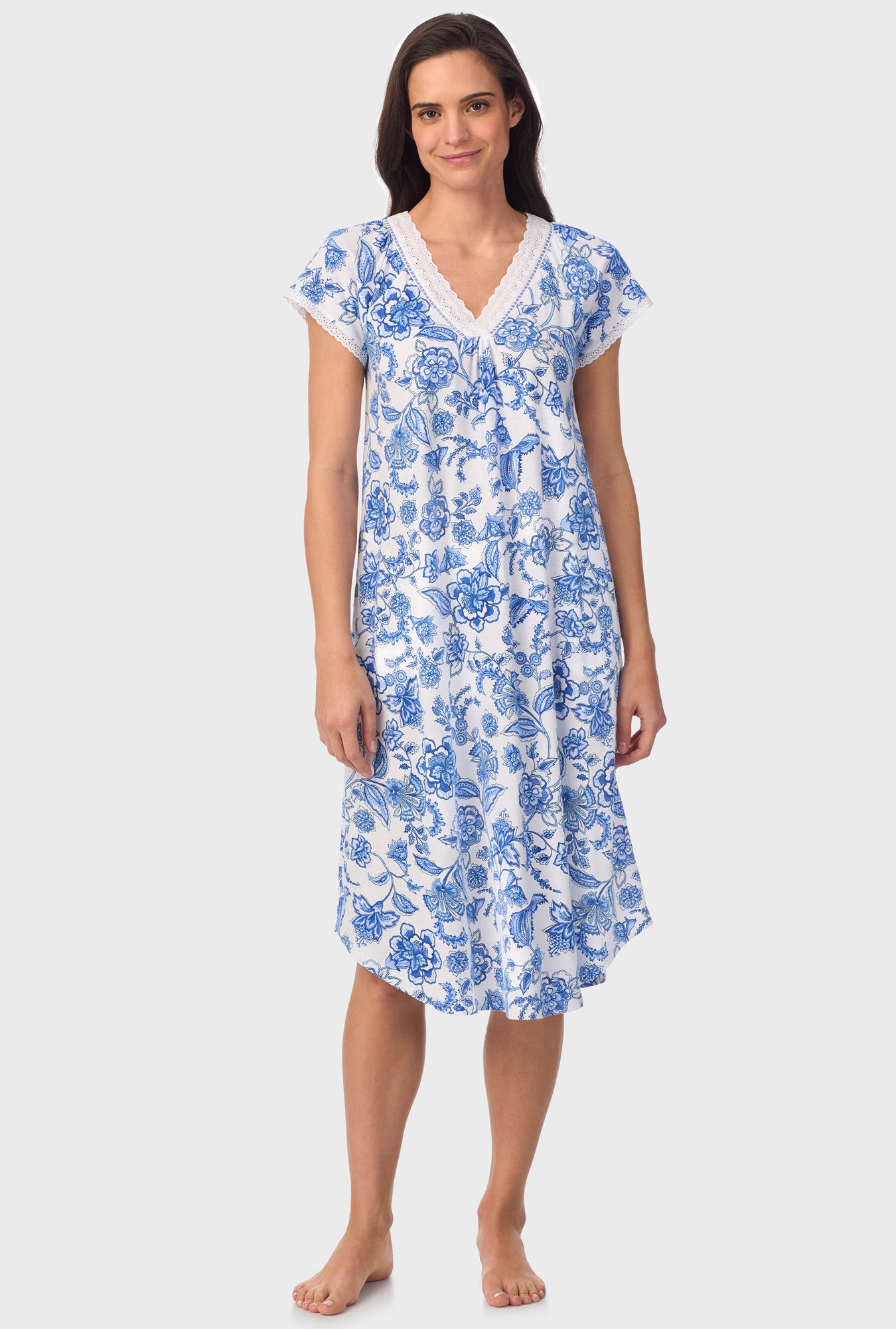 A lady wearing blue short Sleeve Floral Vine Cap Sleeve Nightgown with Colbalt Blue print