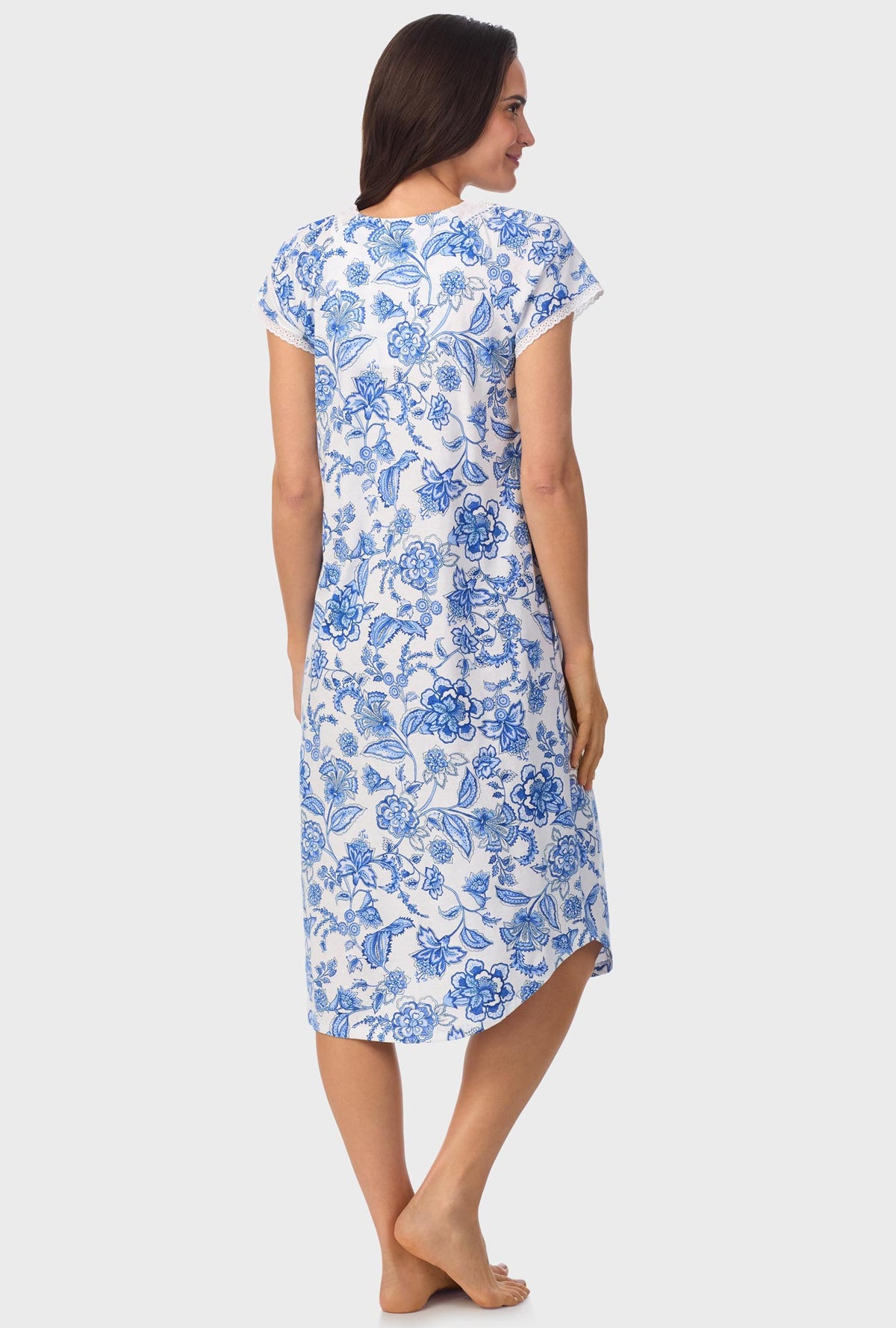 A lady wearing blue short Sleeve Floral Vine Cap Sleeve Nightgown with Colbalt Blue print