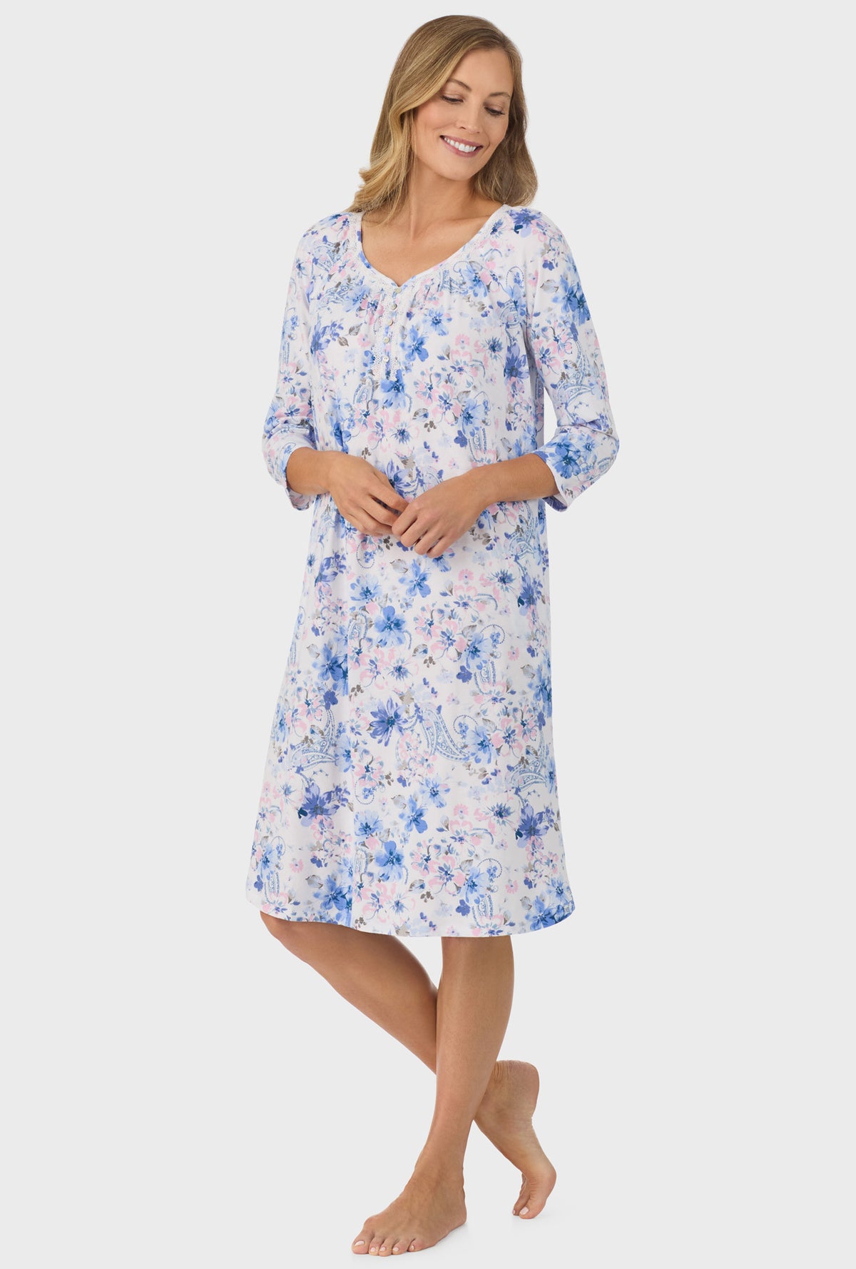 A lady wearing Blue and Blush Pink Paisley Floral 3/4 Sleeve Nightgown