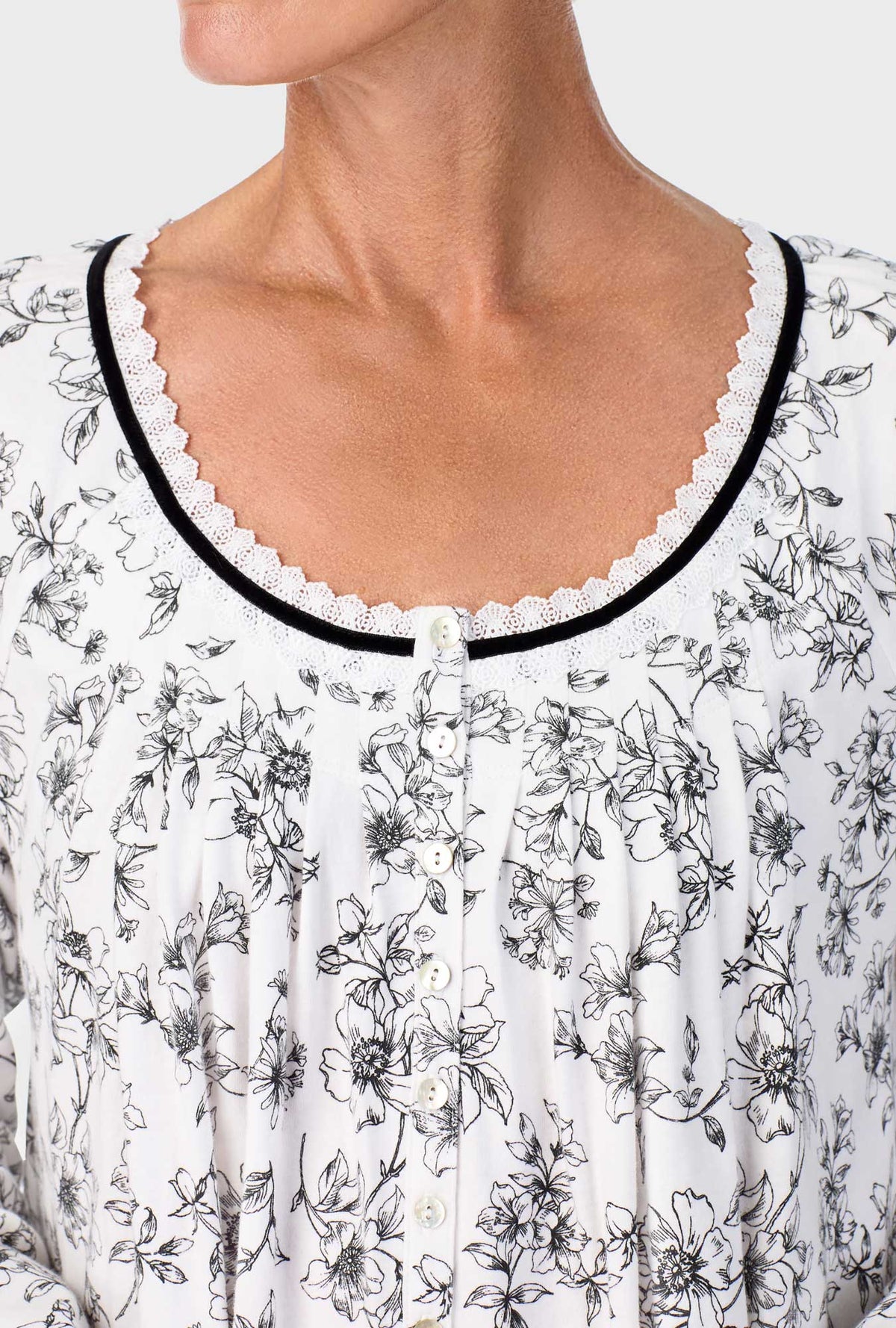 A lady wearing Ivory Floral Long Sleeve Nightgown