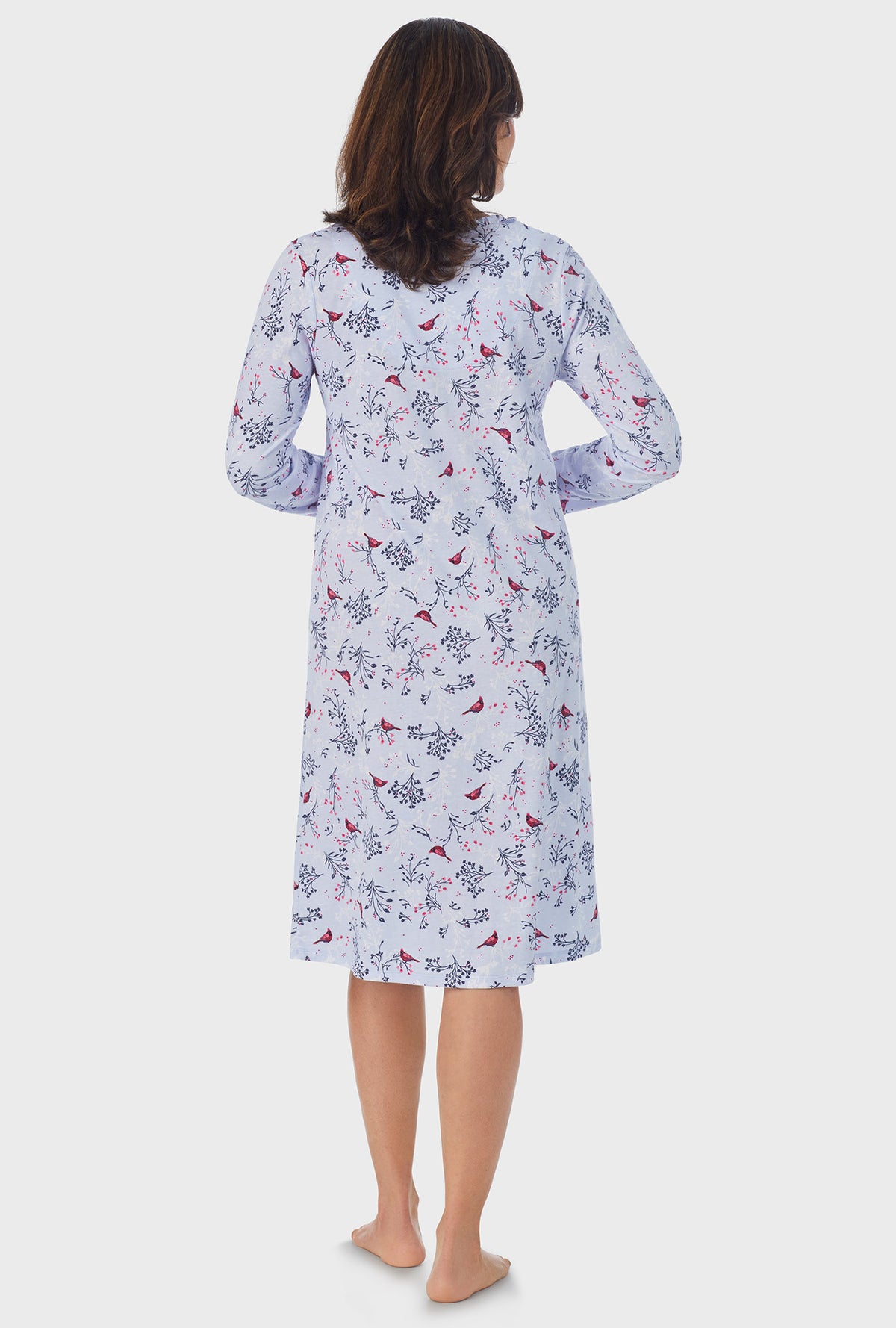 A lady wearing white Long Sleeve Midi Nightgown with Winter Blue Cardinal  print