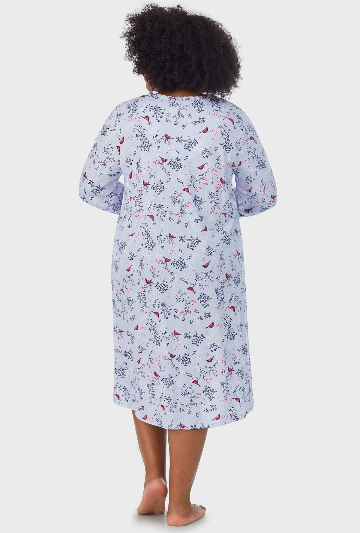 A lady wearing white Long Sleeve Midi plus size Nightgown with Winter Blue Cardinal  print