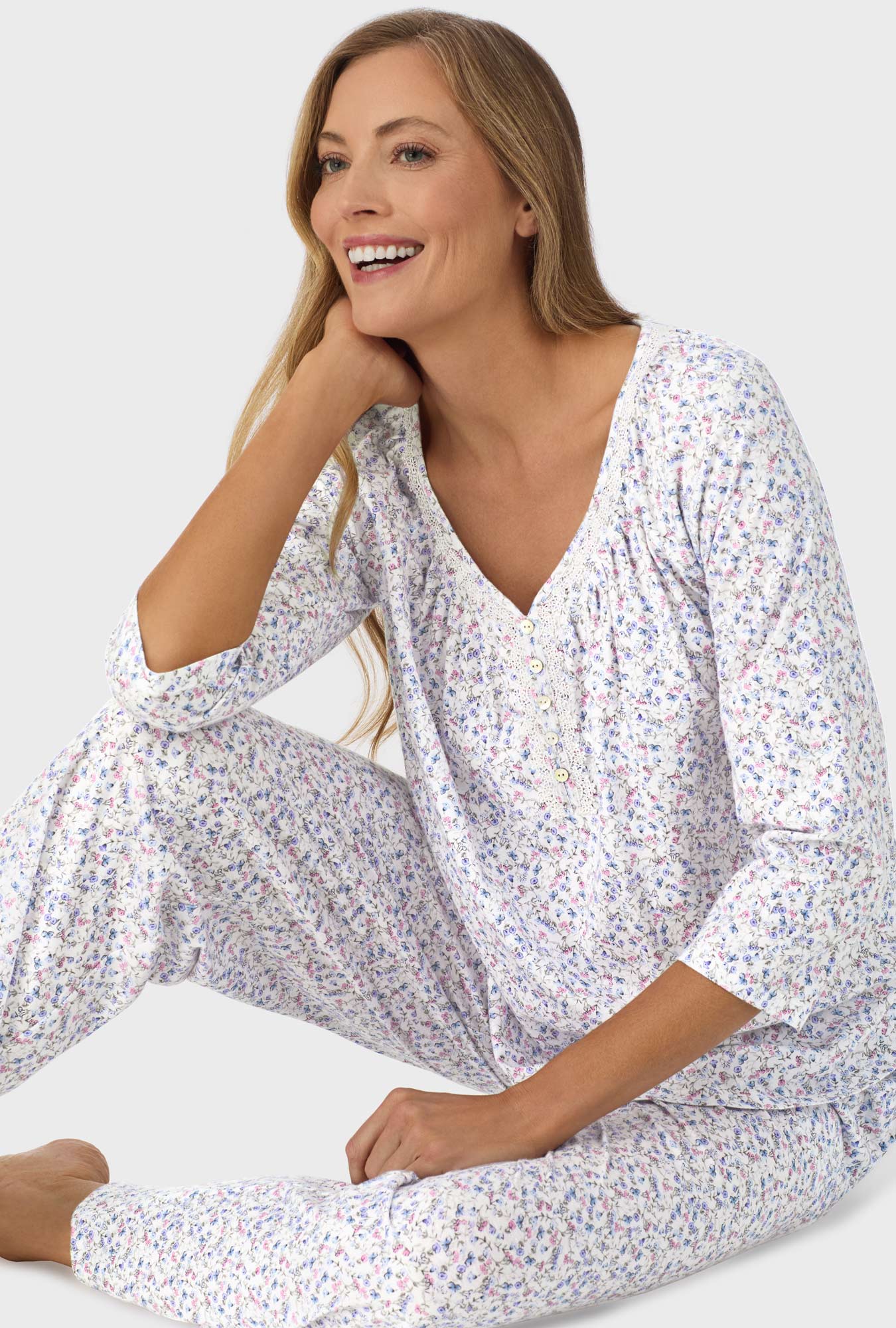 A lady wearing Blue and Blush Pink Ditsy 3/4 Sleeve Long Pant PJ Set