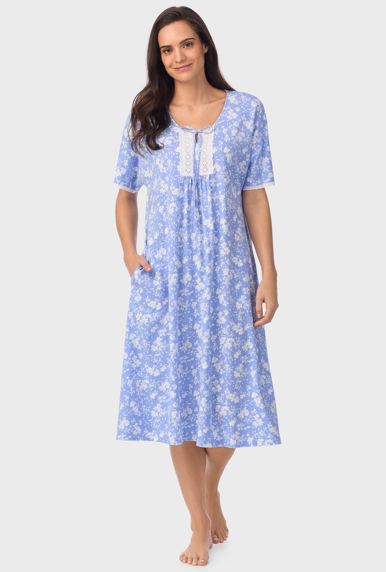 A lady wearing blue Long Sleeve Floral Caftan  with Powder Blue print
