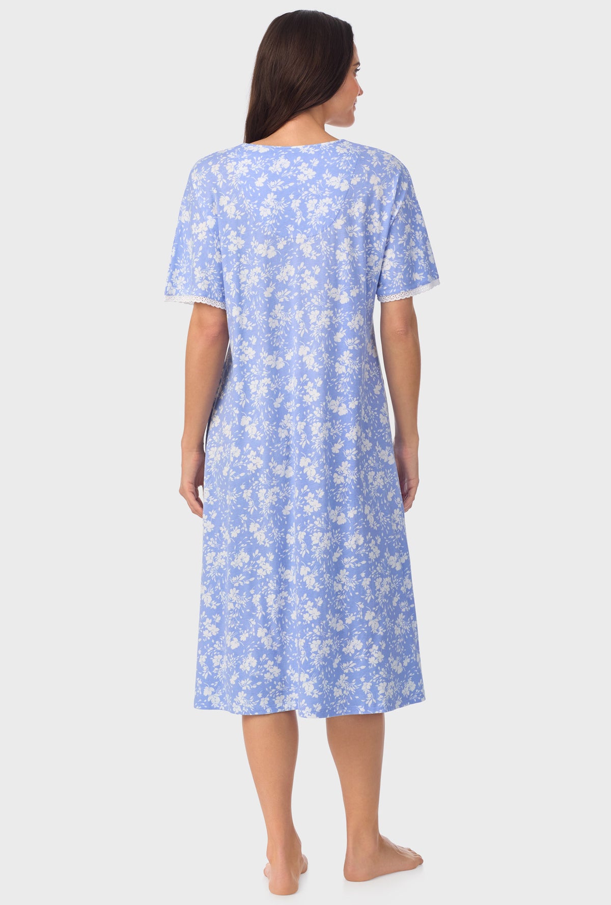 A lady wearing blue Long Sleeve Floral Caftan  with Powder Blue print