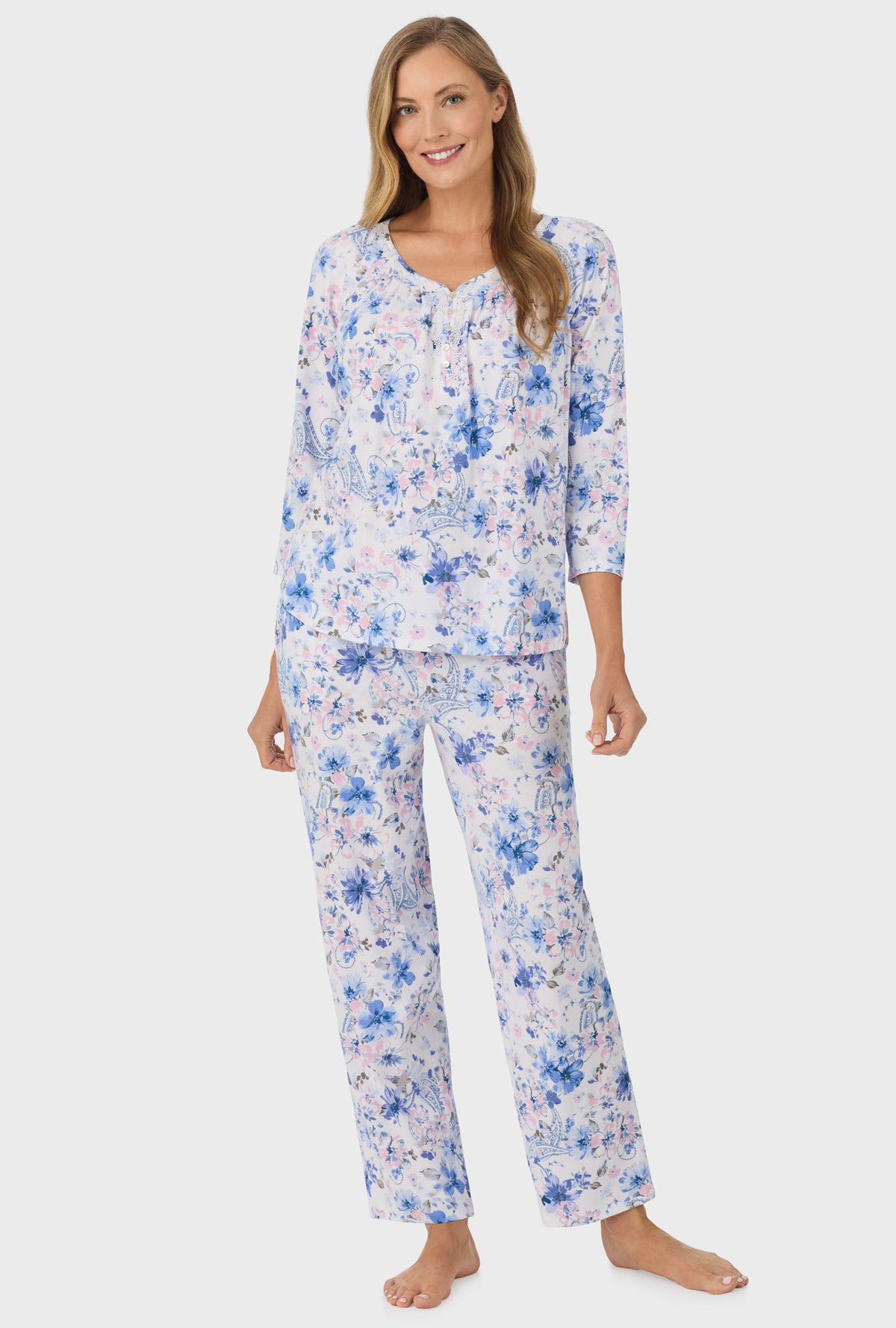 A lady wearing Blue and Blush Pink Paisley Floral  3/4 Sleeve Long Pant PJ Set