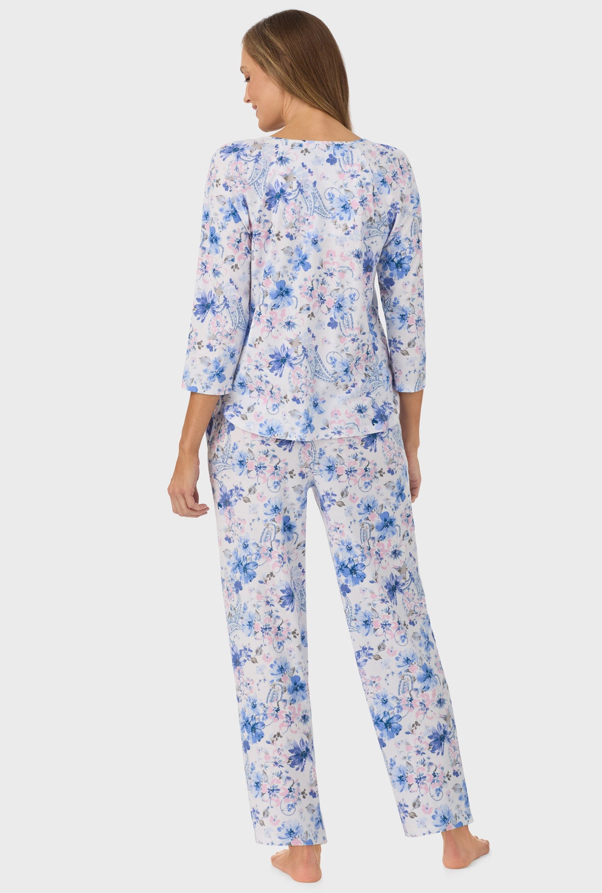 A lady wearing Blue and Blush Pink Paisley Floral  3/4 Sleeve Long Pant PJ Set