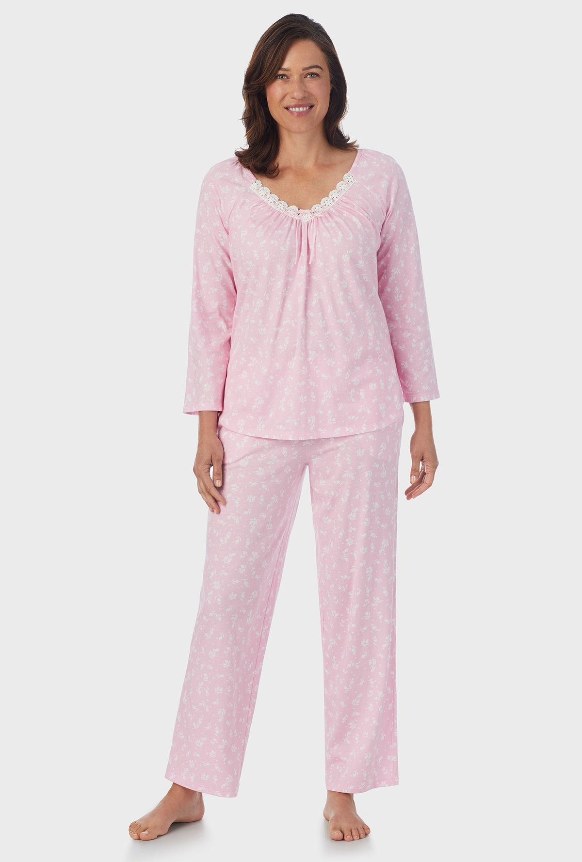 A lady wearing pink 3/4 Sleeve Long Pant PJ Set with White Rosebuds  print