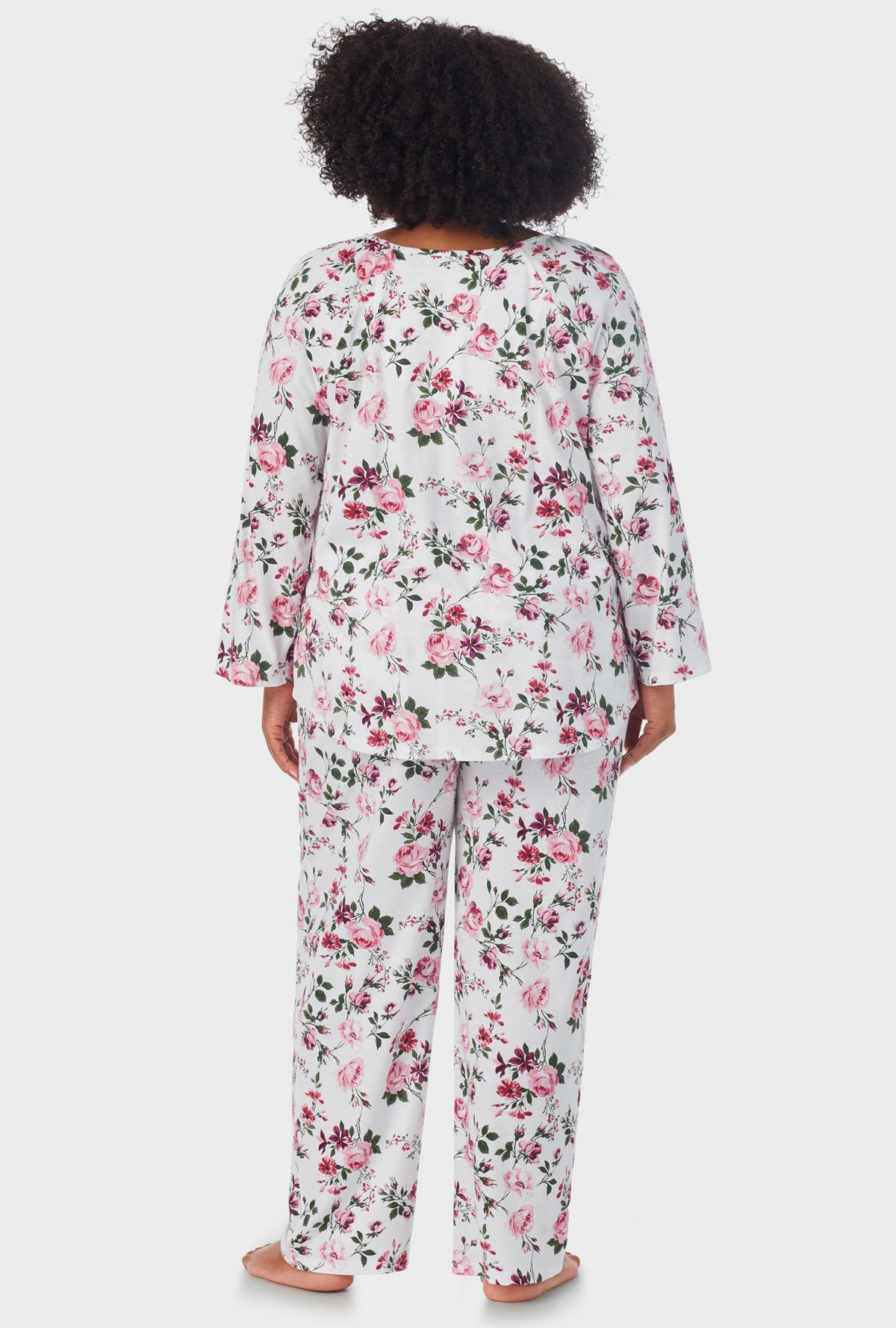 A lady wearing 3/4 Sleeve Long Pant plus size PJ Set with Pink and Berry Roses   print