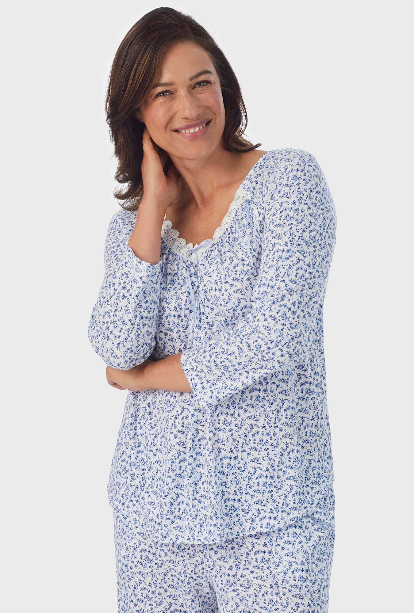 A lady wearing white Long Sleeve 3/4 Sleeve Long Pant PJ Set with Dusty Blue  print