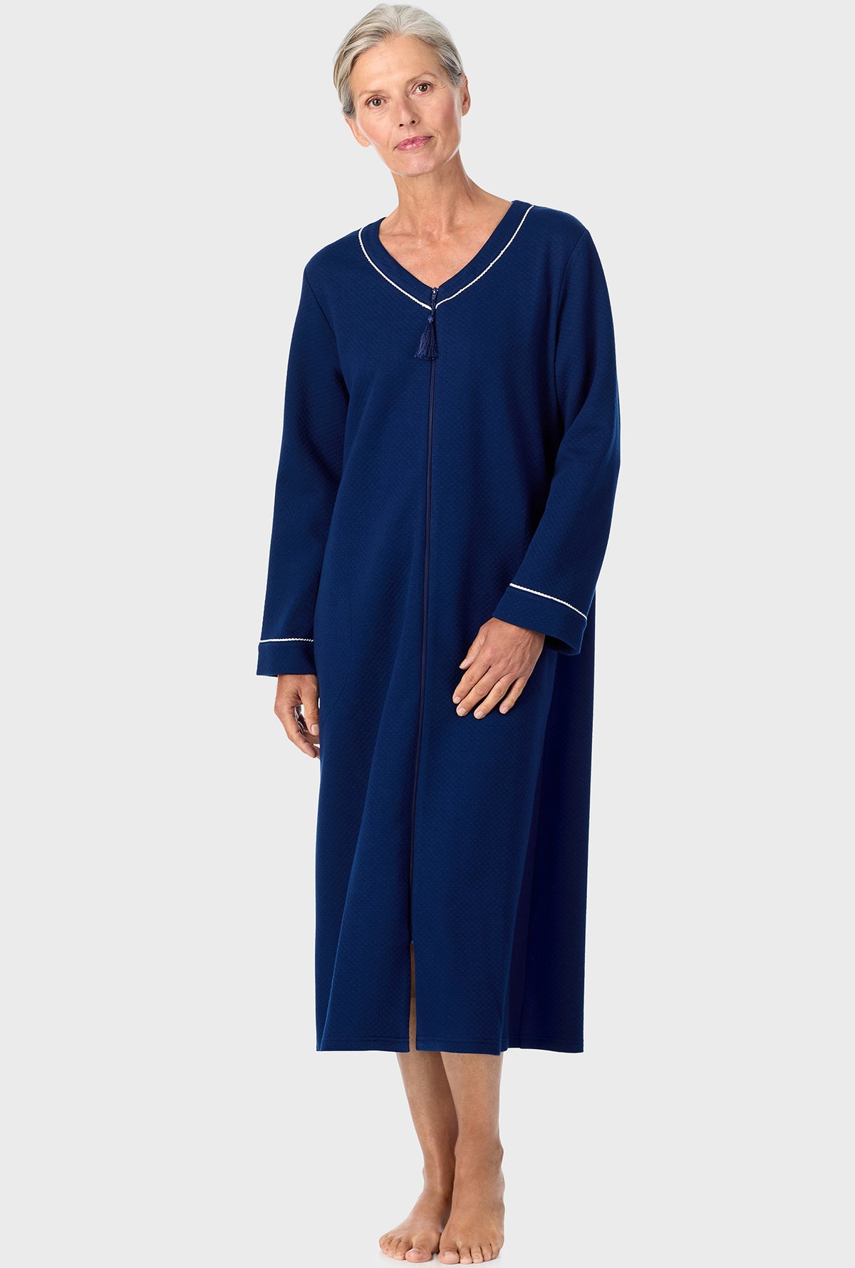 A lady wearing Navy Diamond Matalasse Zip Front Robe