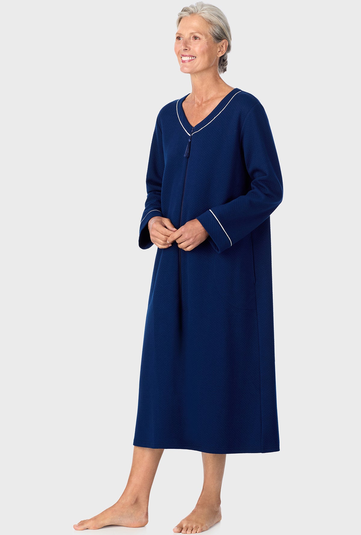 A lady wearing Navy Diamond Matalasse Zip Front Robe