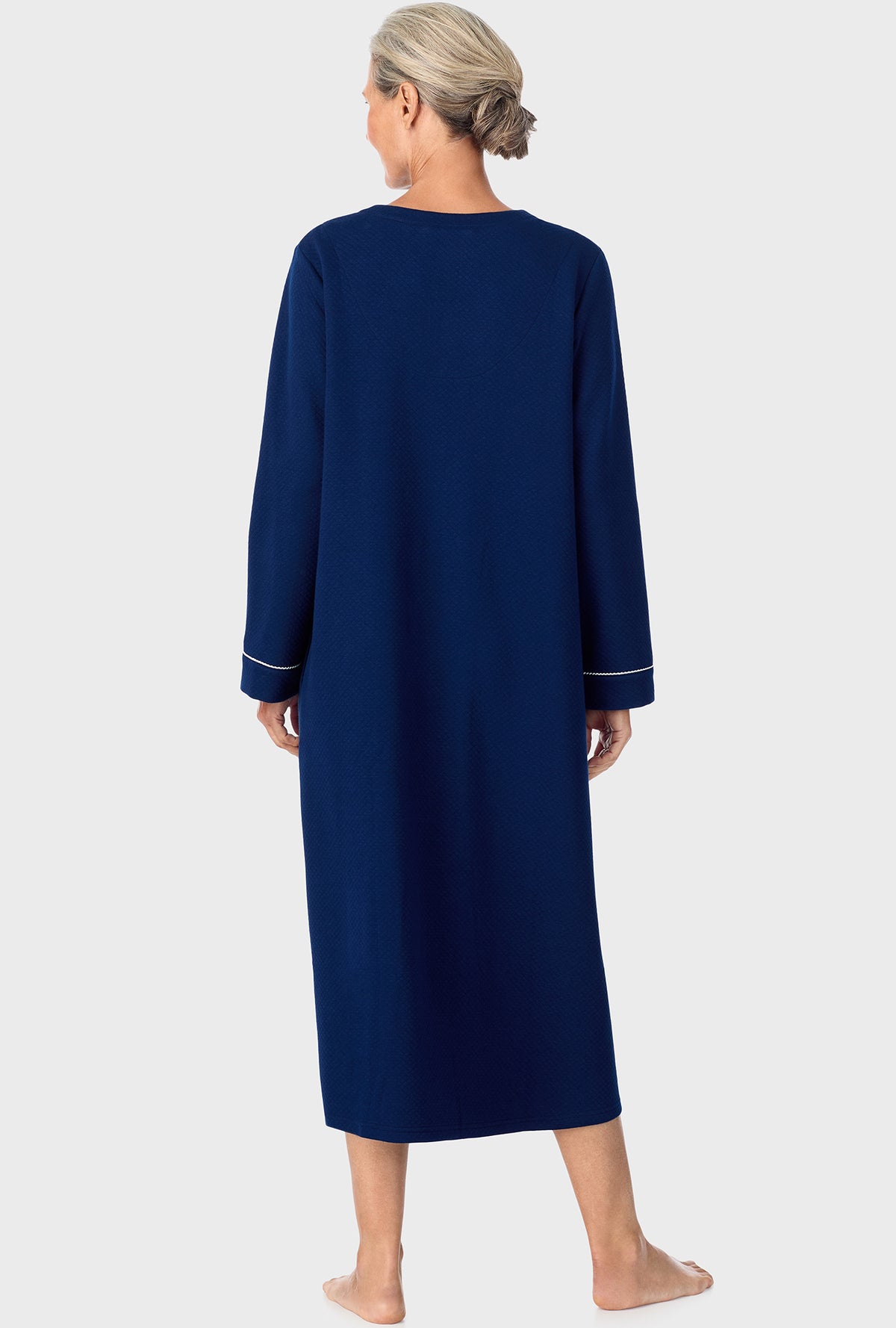 A lady wearing Navy Diamond Matalasse Zip Front Robe