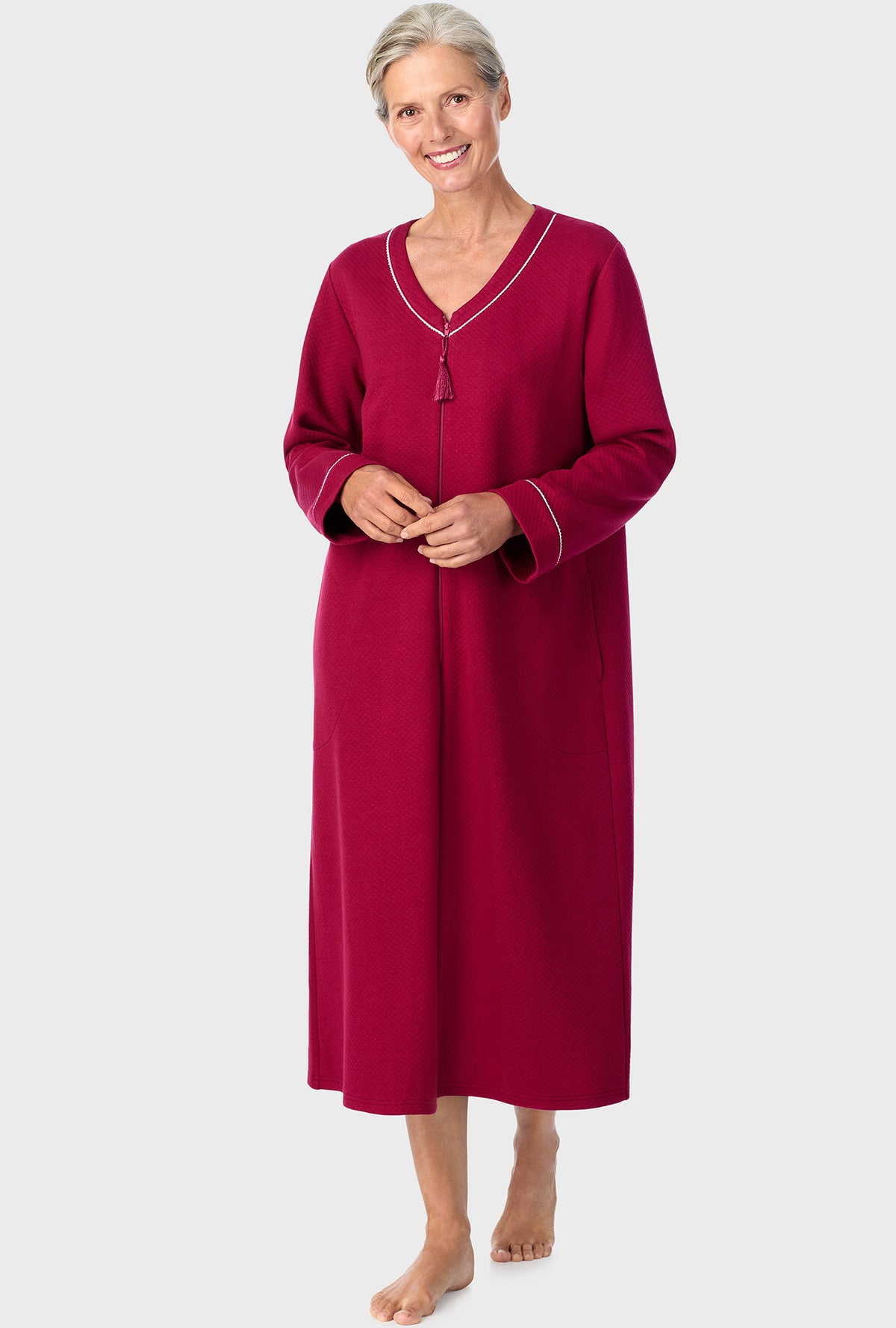 A lady wearing  wine zip front robe