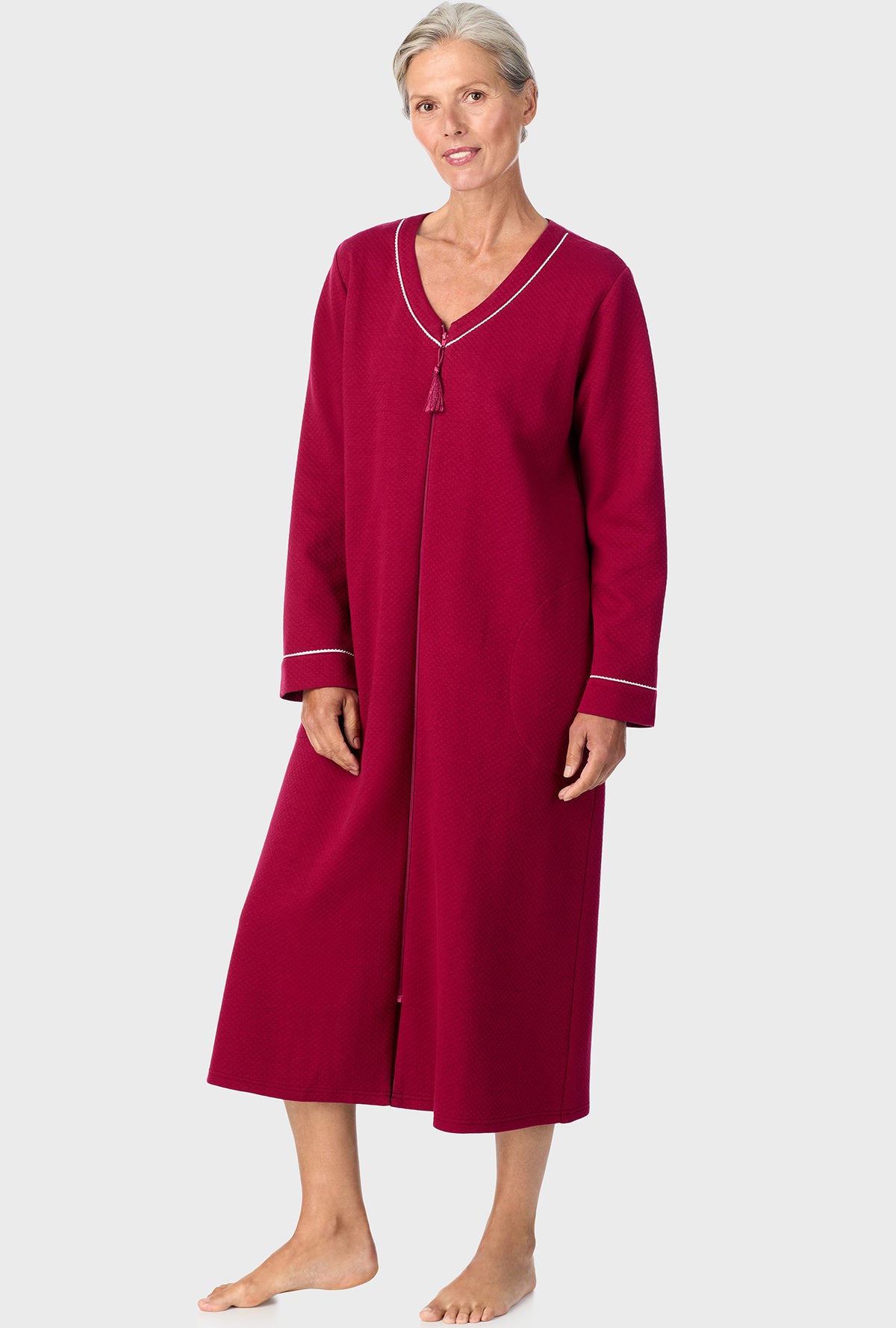 A lady wearing  wine zip front robe