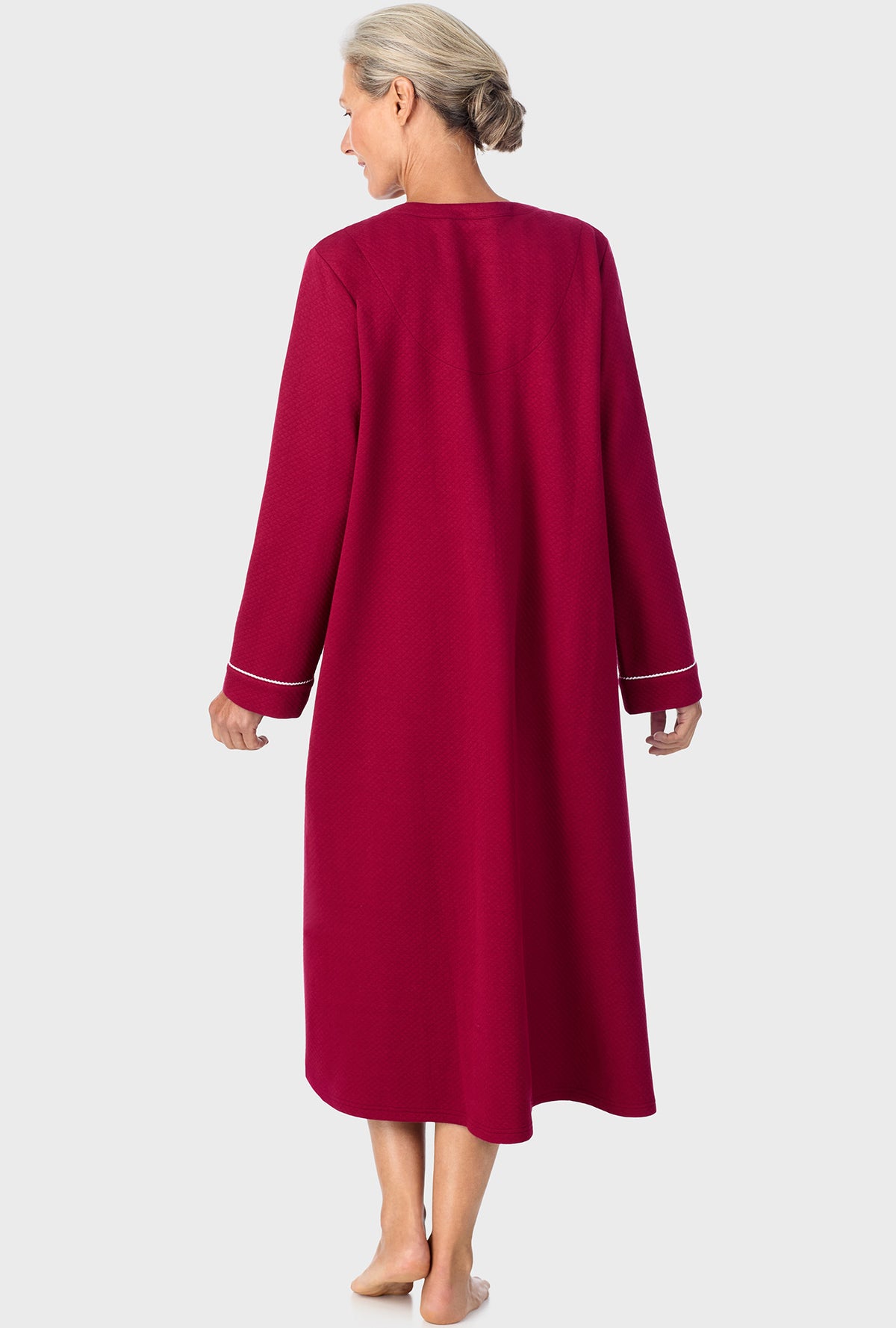 A lady wearing  wine zip front robe