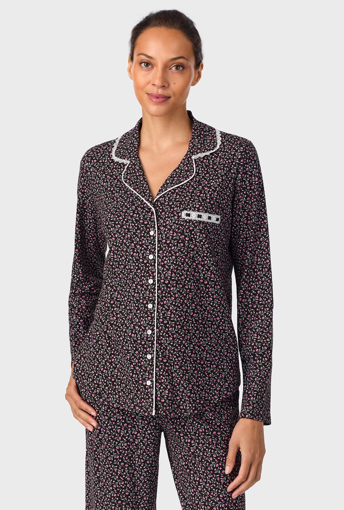 A lady wearing Midnight Floral Classic Cotton Knit Notch Pajama