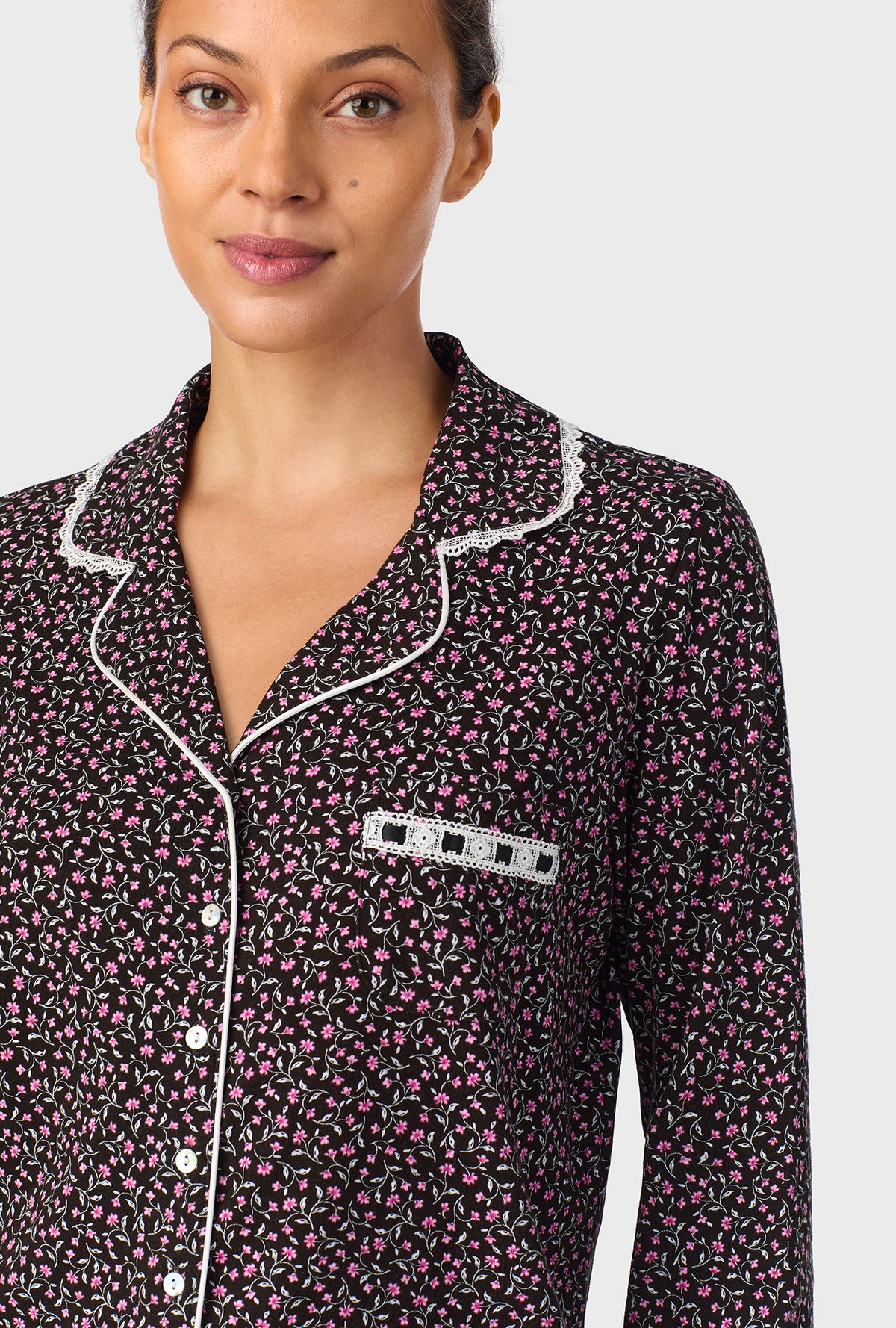 A lady wearing Midnight Floral Classic Cotton Knit Notch Pajama