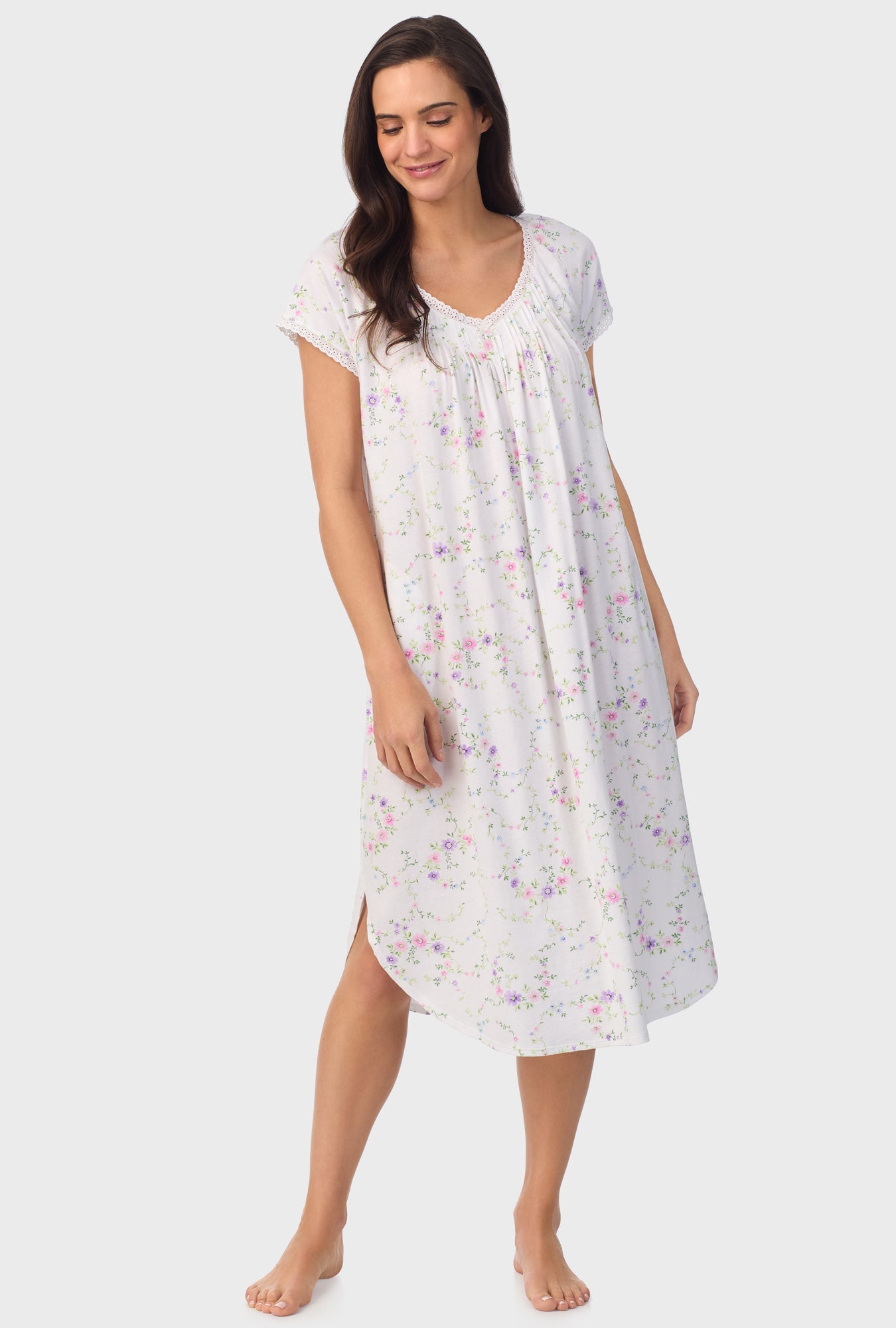 A lady wearing white short sleeve Viney Floral Cap Sleeve Nightgown with Lilac and Cherry Blossom print