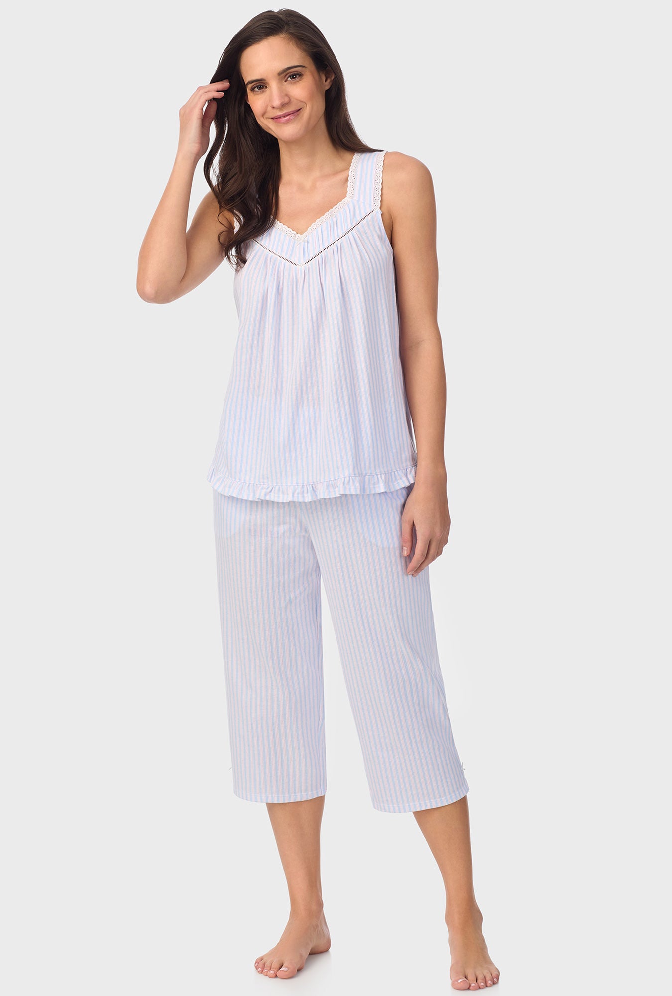 A lady wearing white sleeveless Blossom Stripes Sleeveless Capri Pant PJ Set with Cotton Blue print