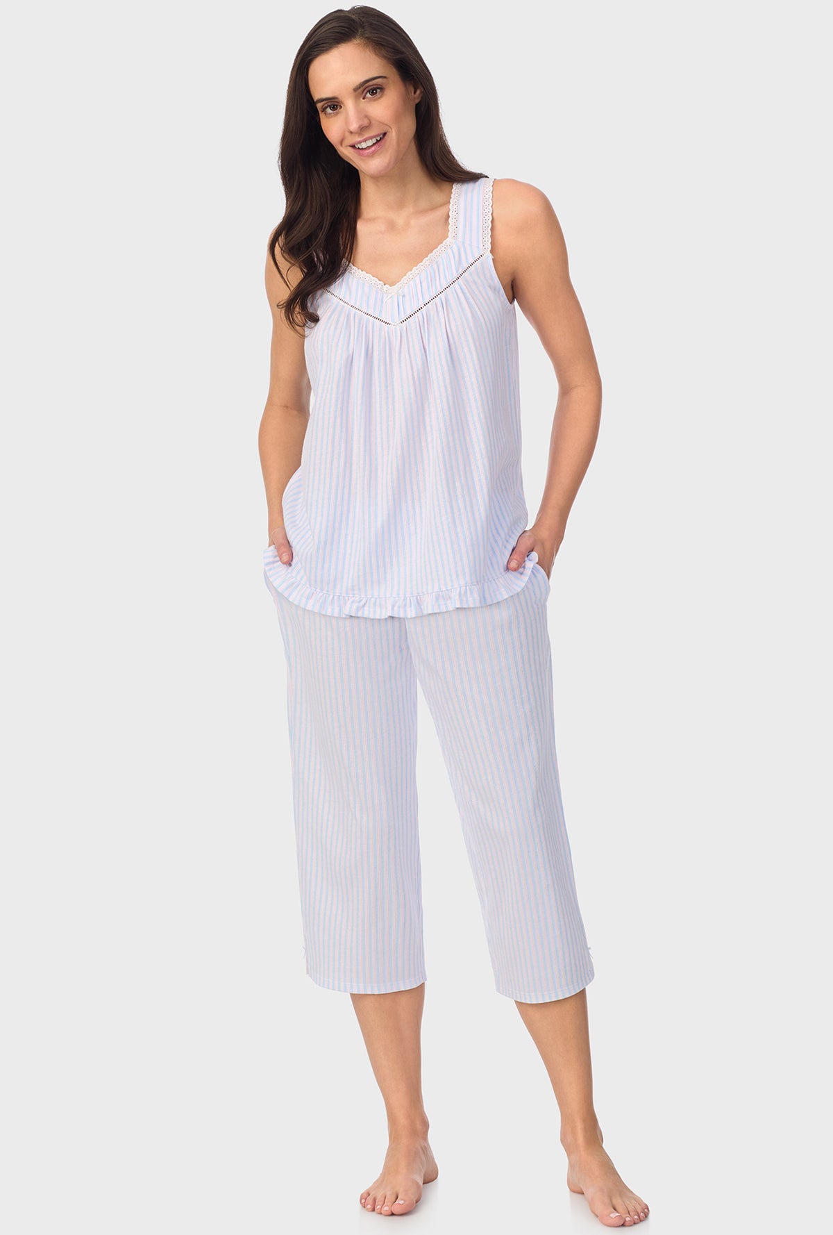 A lady wearing white sleeveless Blossom Stripes Sleeveless Capri Pant PJ Set with Cotton Blue print