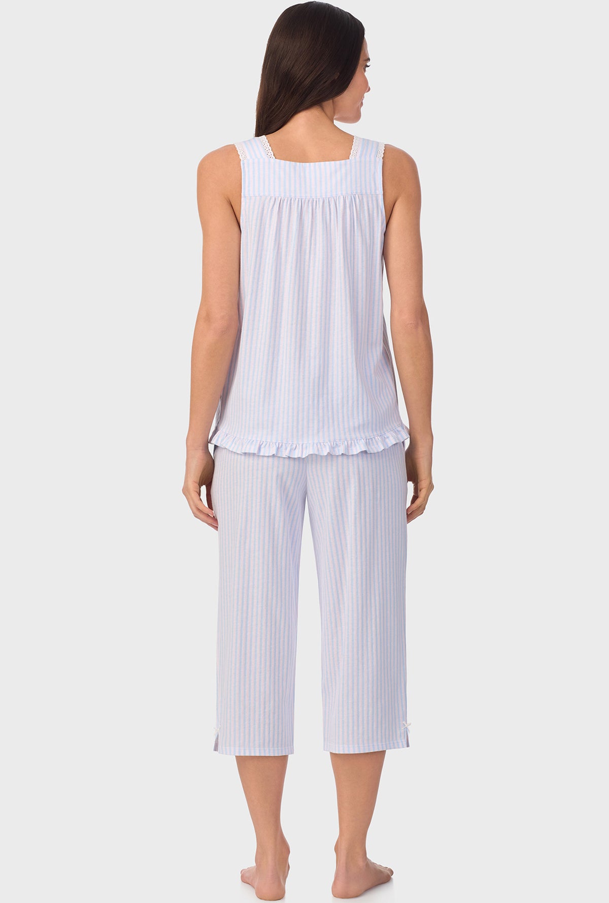 A lady wearing white sleeveless Blossom Stripes Sleeveless Capri Pant PJ Set with Cotton Blue print