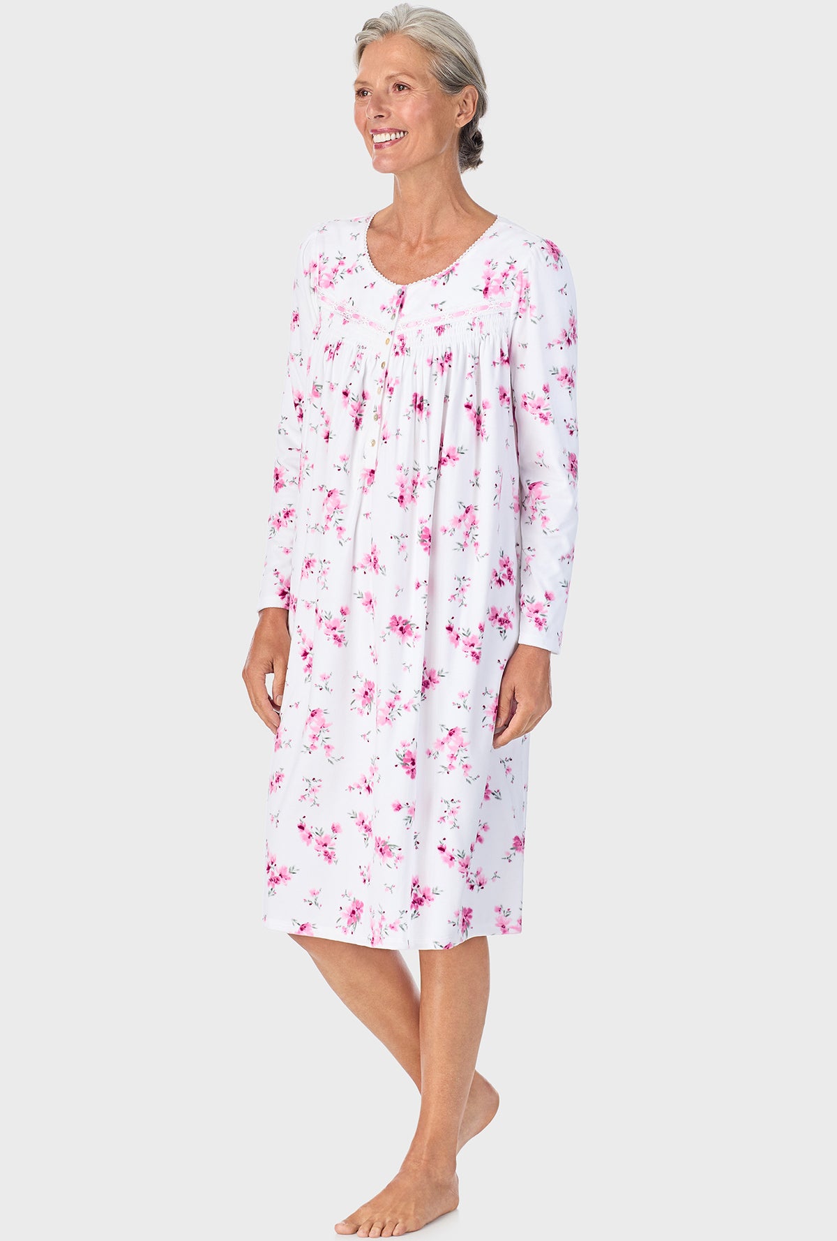 A lady wearing Mauve Floral Long Sleeve Nightgown