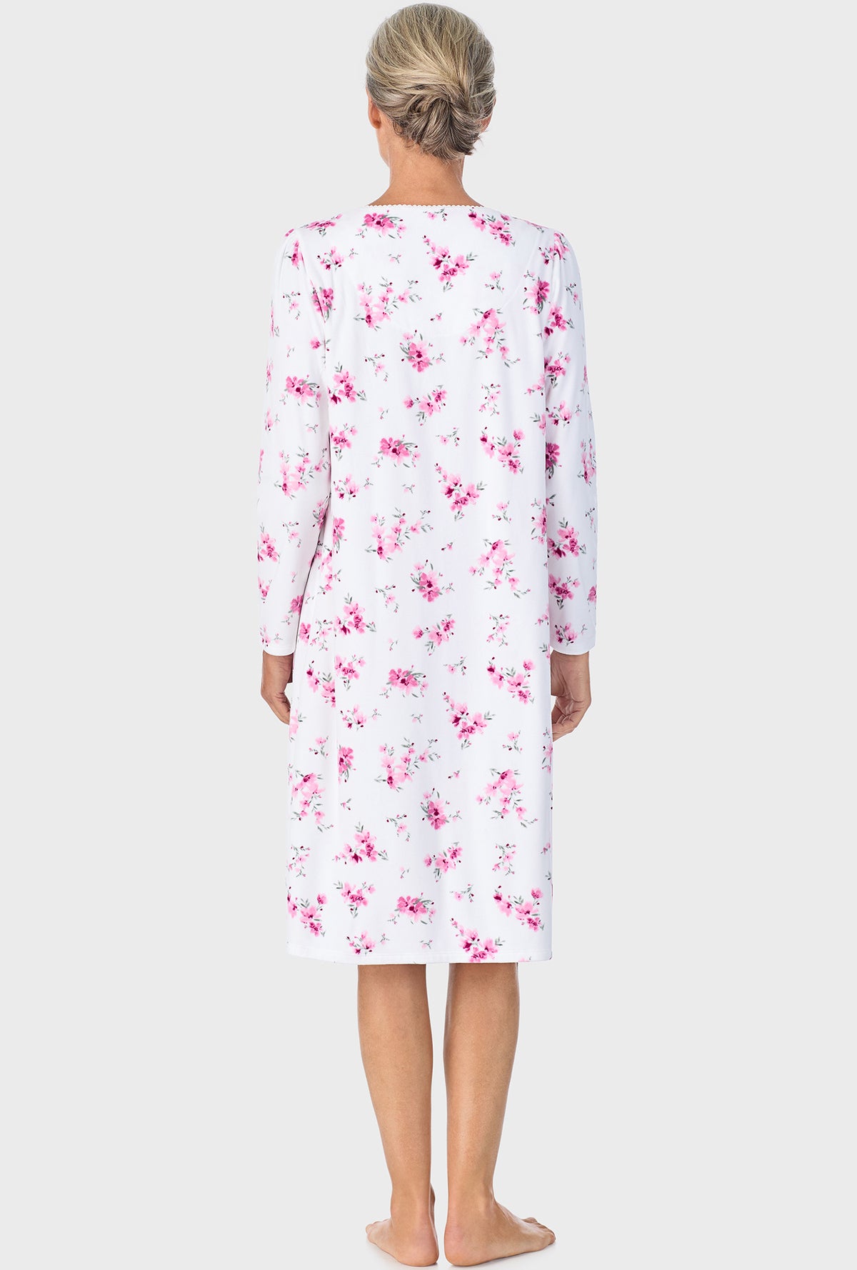 A lady wearing Mauve Floral Long Sleeve Nightgown