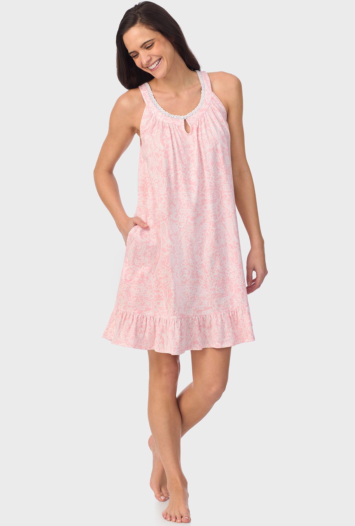 A lady wearing  pink sleeveless  Chemise with  Coral Pink Paisley print