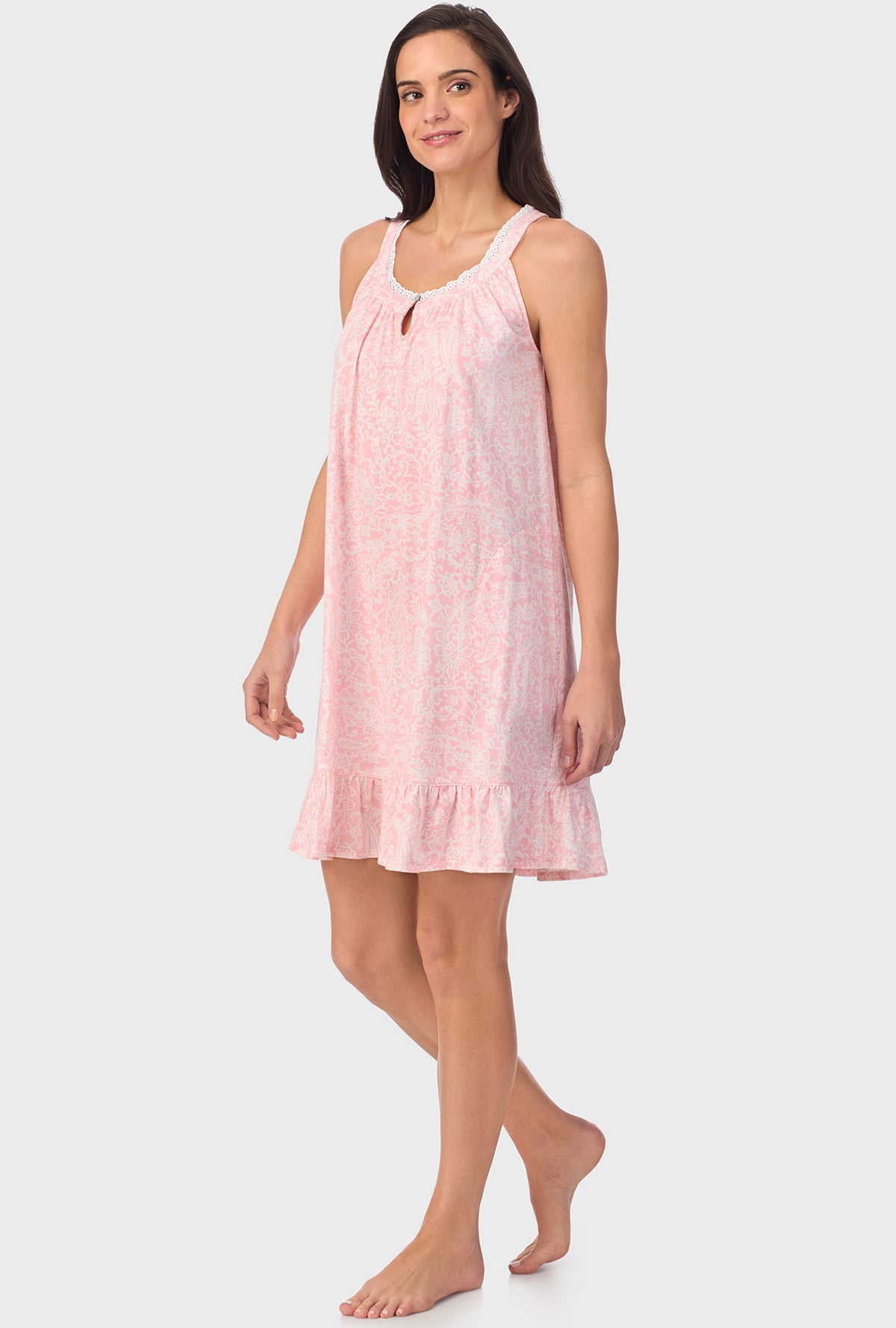 A lady wearing  pink sleeveless  Chemise with  Coral Pink Paisley print