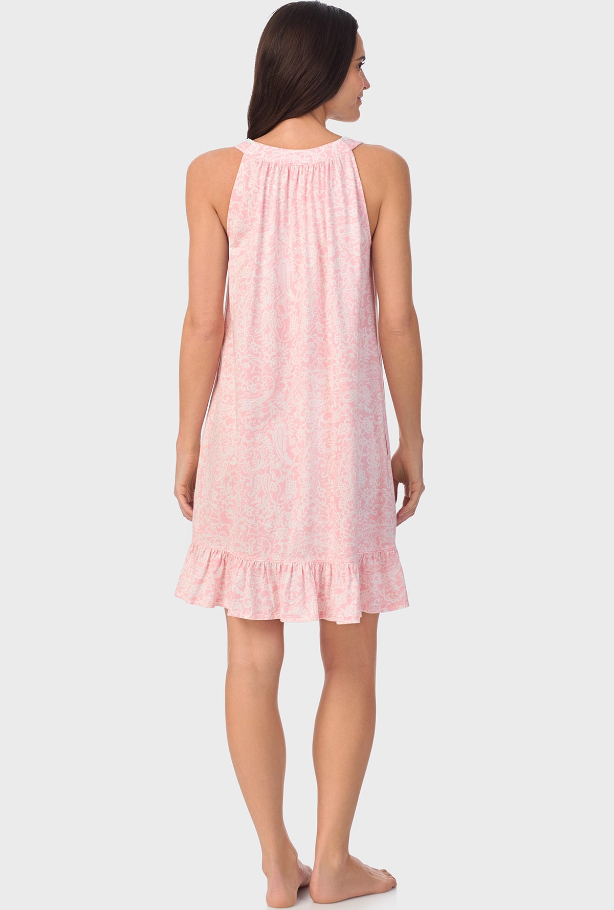 A lady wearing  pink sleeveless  Chemise with  Coral Pink Paisley print