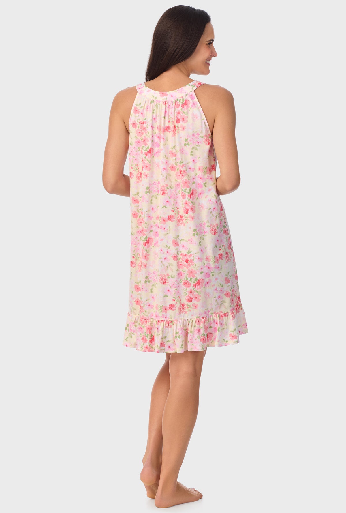 A lady wearing pink sleeveless Chemise with Buttermilk Floral