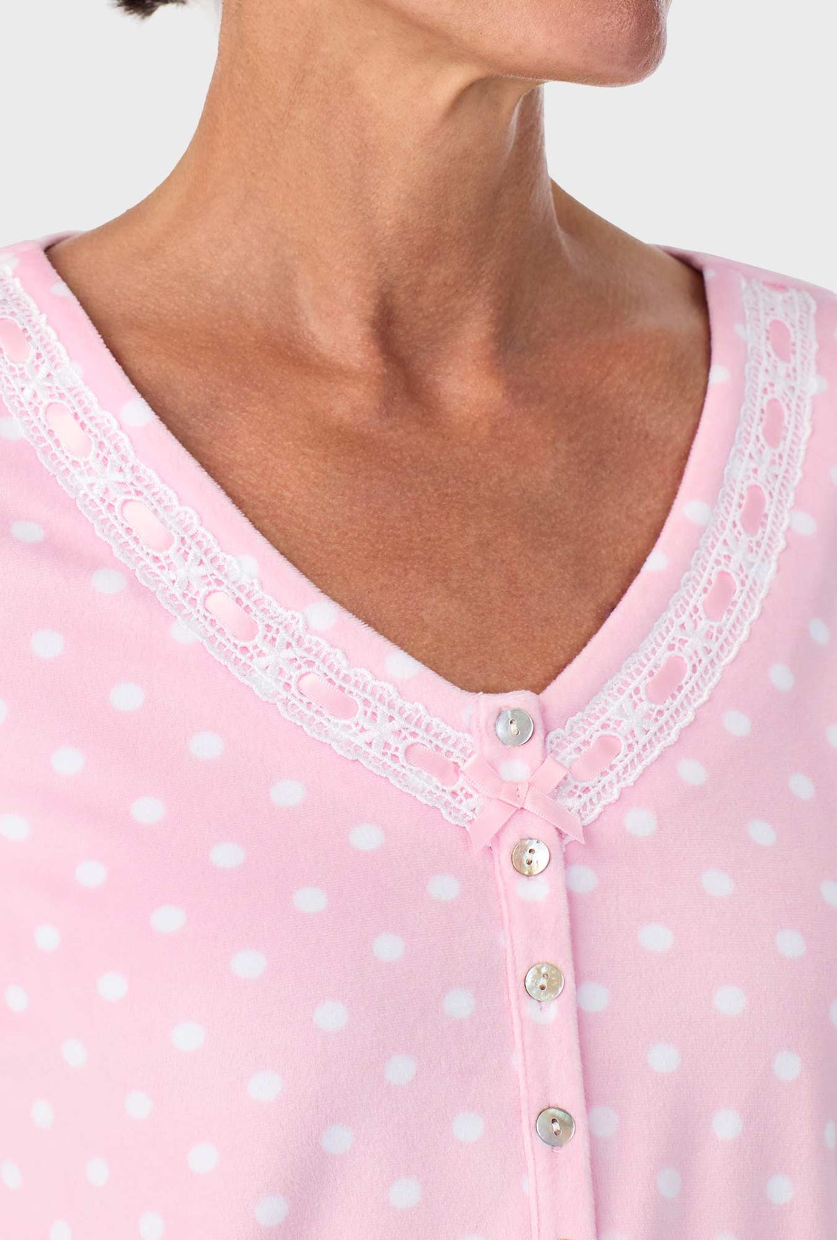 A lady wearing Pink Tulle Dot Long Sleeve Henley PJ Set