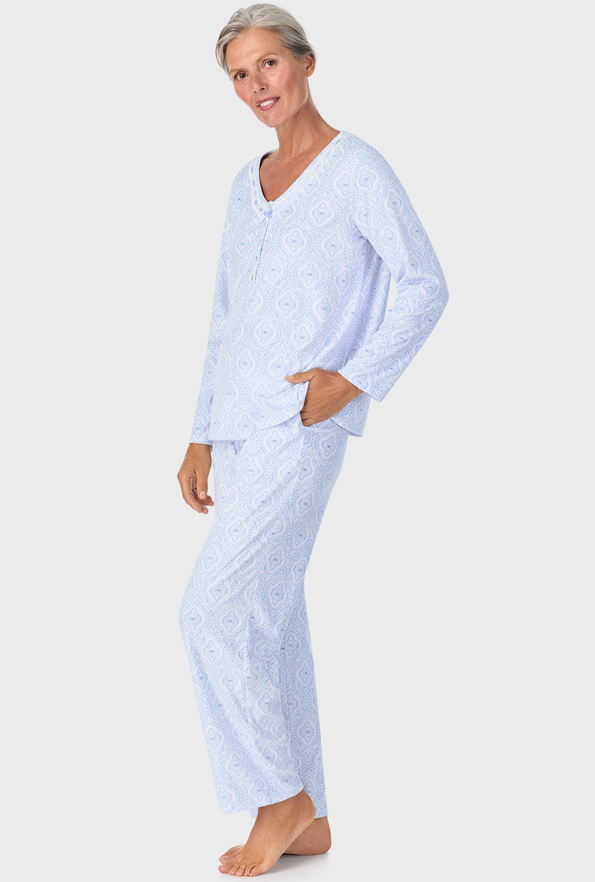 A lady wearing Ice Blue Geo Long Sleeve Henley PJ Set