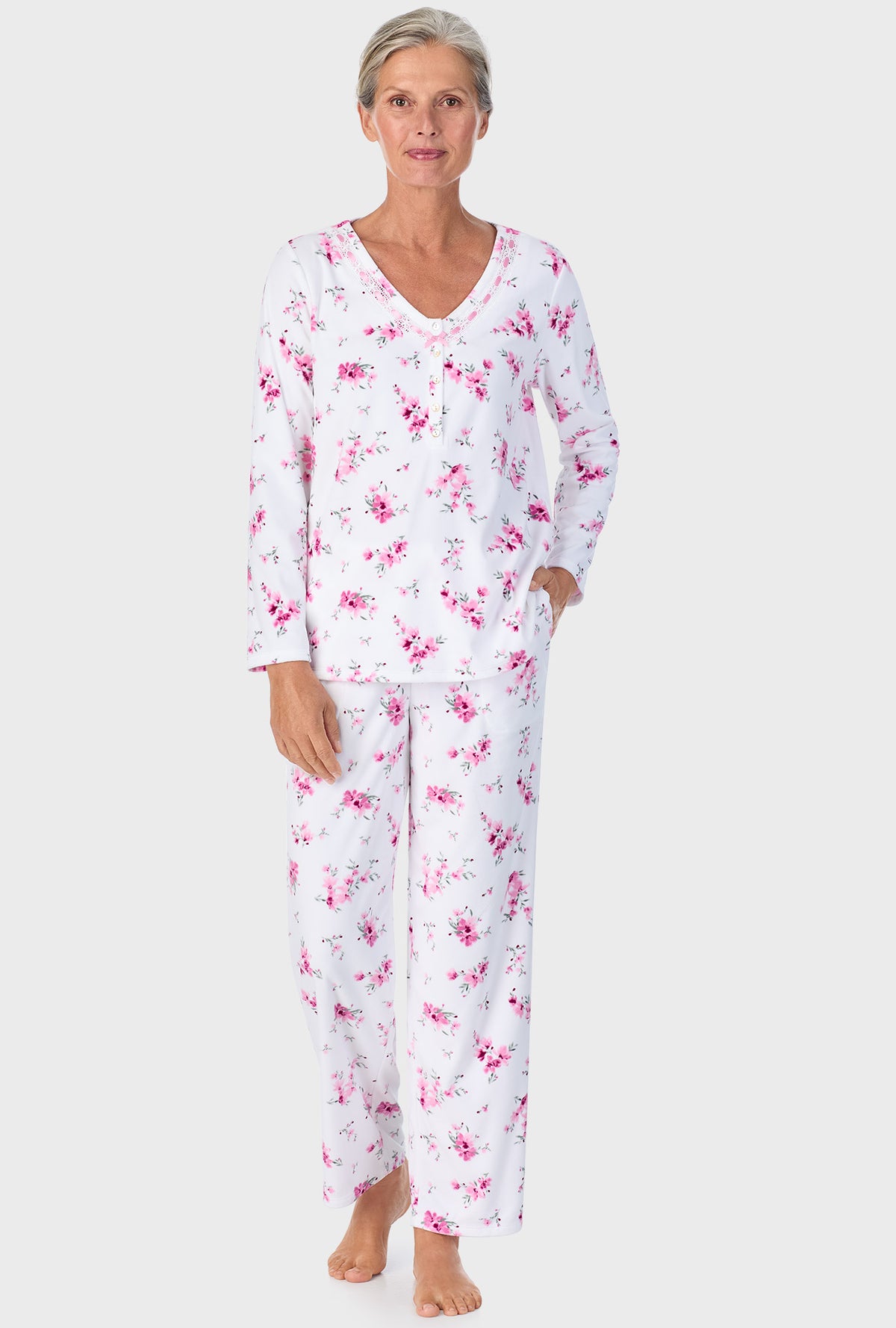 A lady wearing Mauve Floral Long Sleeve Henley PJ Set