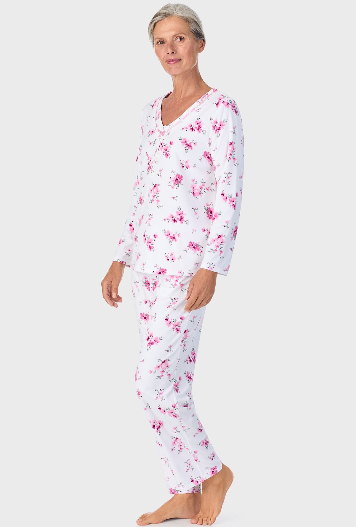 A lady wearing Mauve Floral Long Sleeve Henley PJ Set