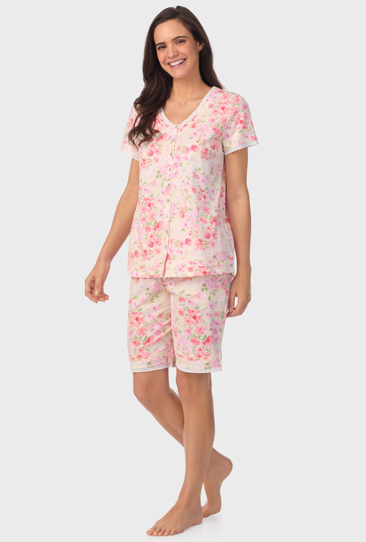 A lady wearing pink short Sleeve Cap Sleeve Bermuda Pant PJ Set with Buttermilk print