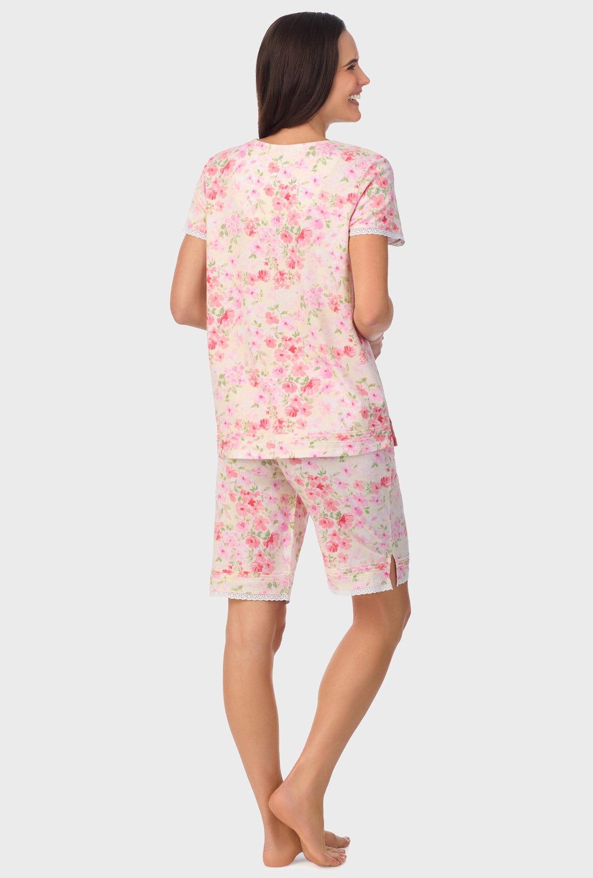 A lady wearing pink short Sleeve Cap Sleeve Bermuda Pant PJ Set with Buttermilk print